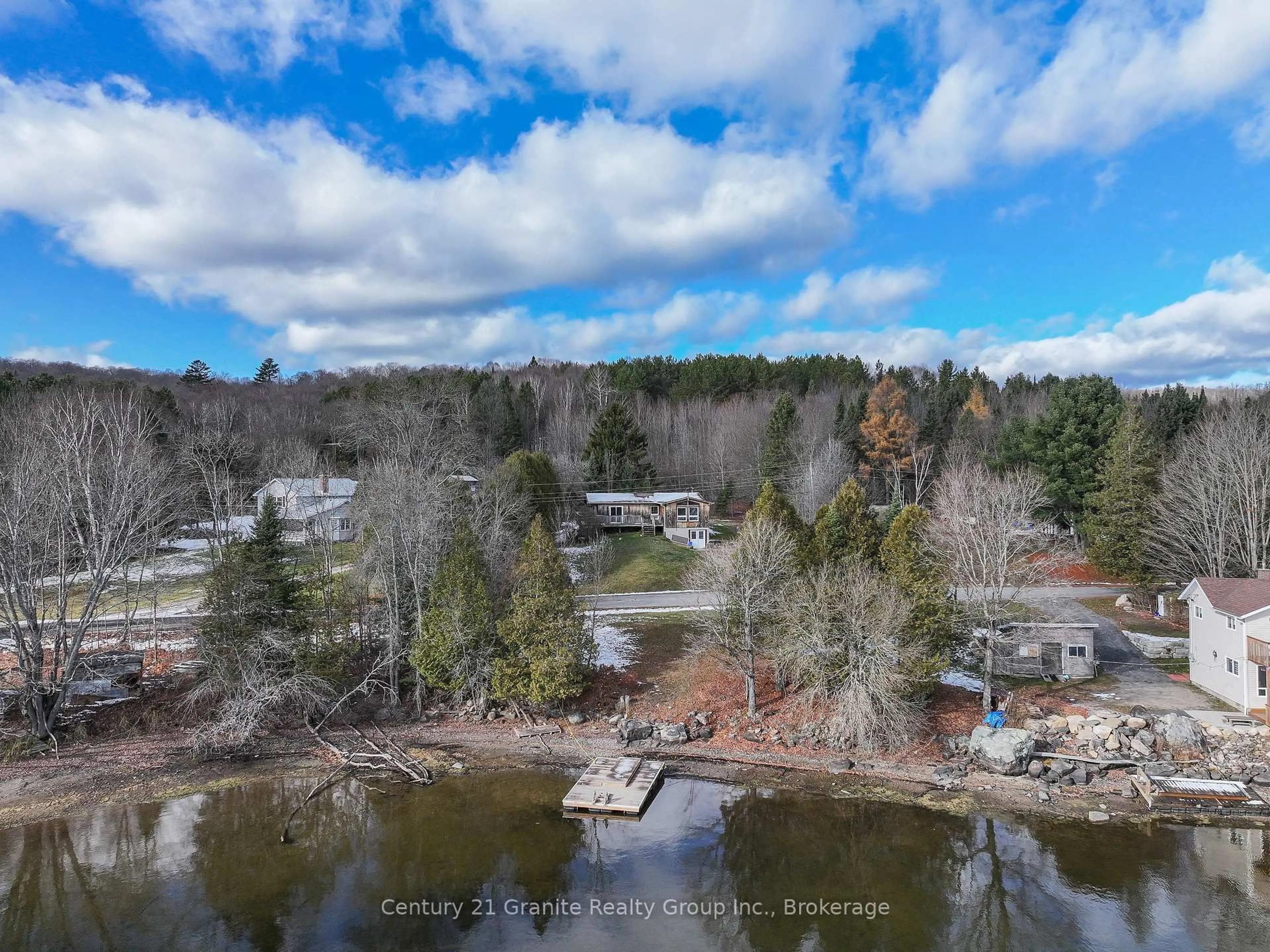 A pic from outside/outdoor area/front of a property/back of a property/a pic from drone, water/lake/river/ocean view for 1309 Nila Rd, Dysart et al Ontario K0M 1S0