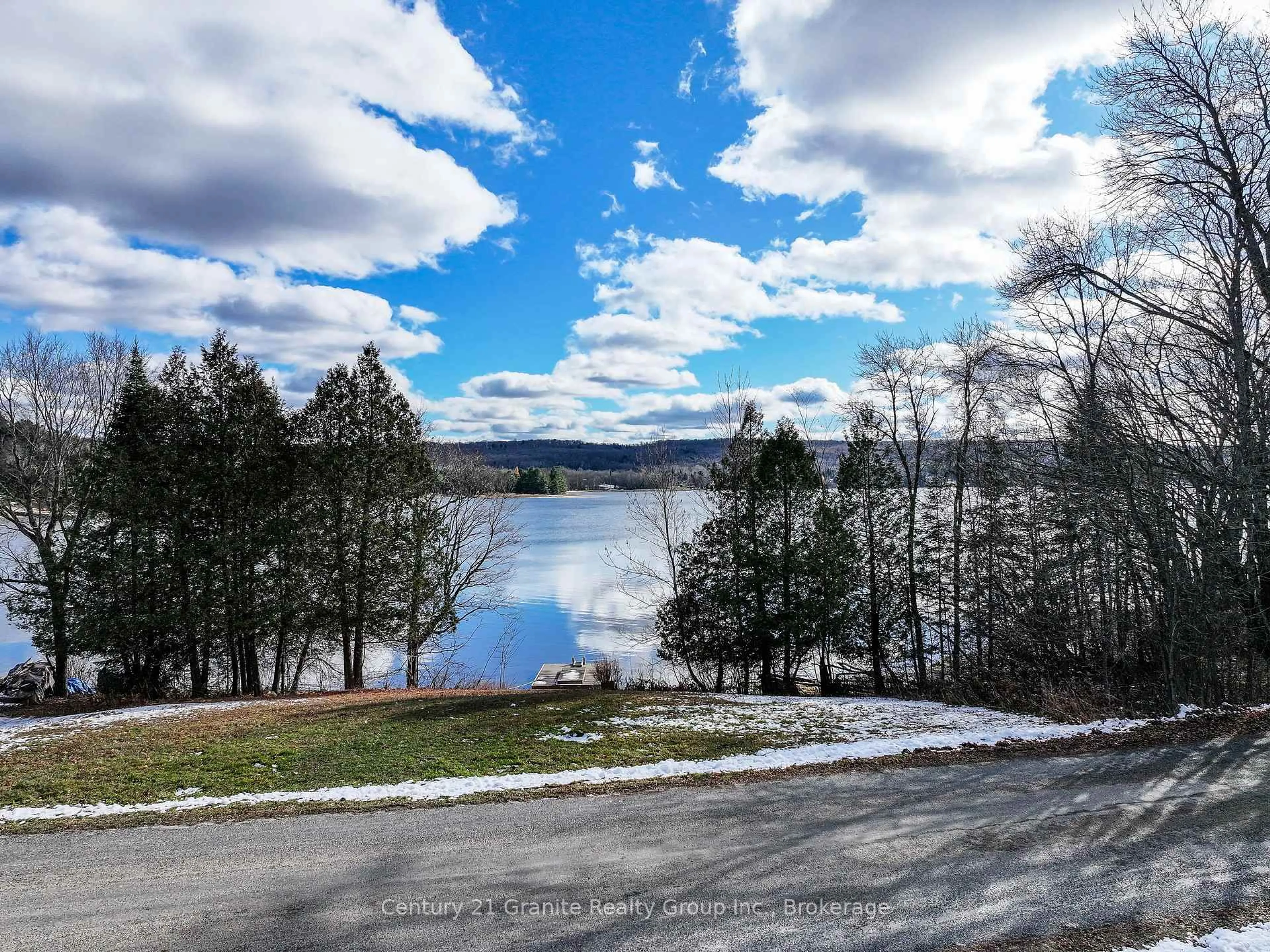 A pic from outside/outdoor area/front of a property/back of a property/a pic from drone, water/lake/river/ocean view for 1309 Nila Rd, Dysart et al Ontario K0M 1S0