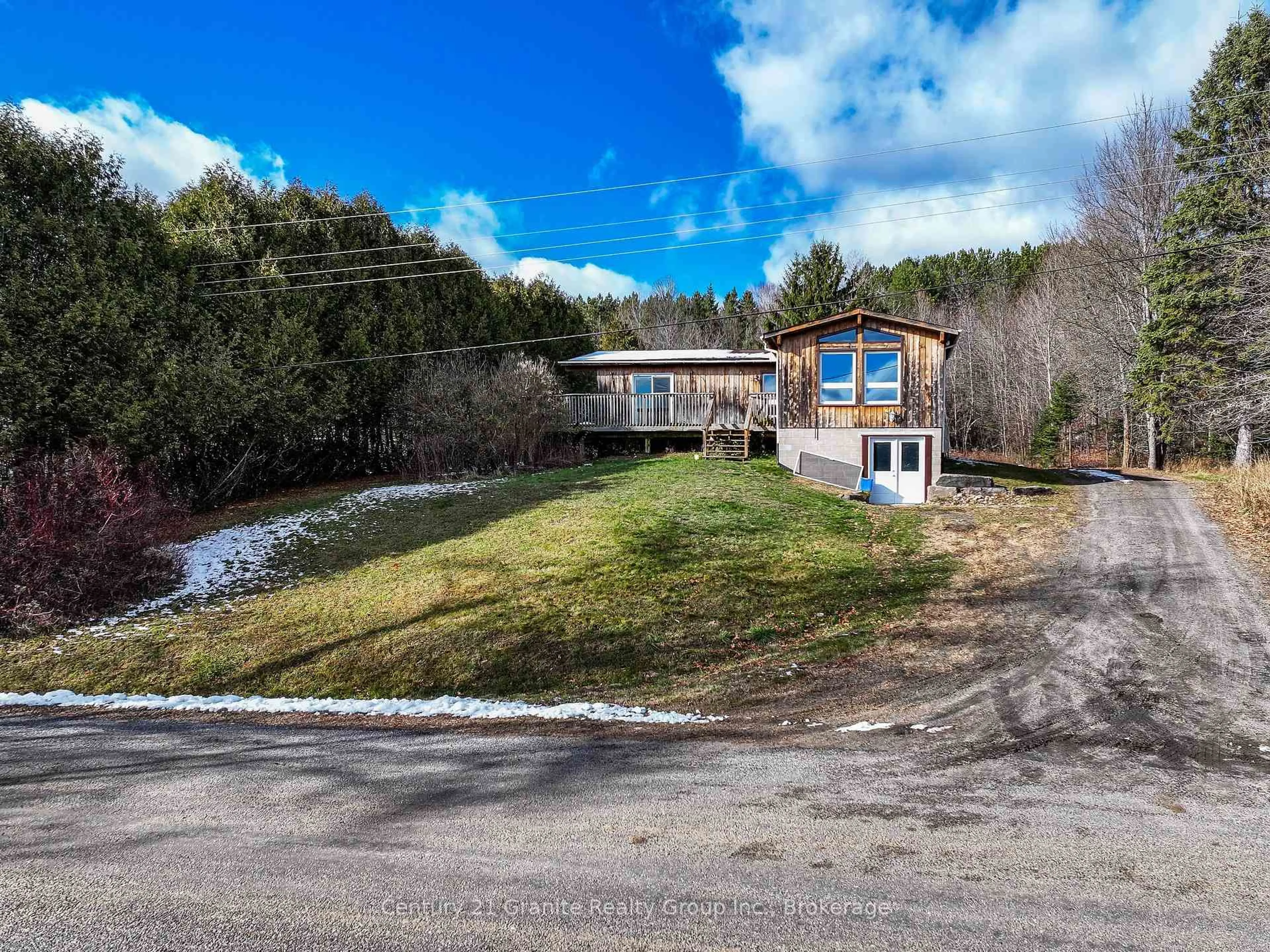 A pic from outside/outdoor area/front of a property/back of a property/a pic from drone, water/lake/river/ocean view for 1309 Nila Rd, Dysart et al Ontario K0M 1S0