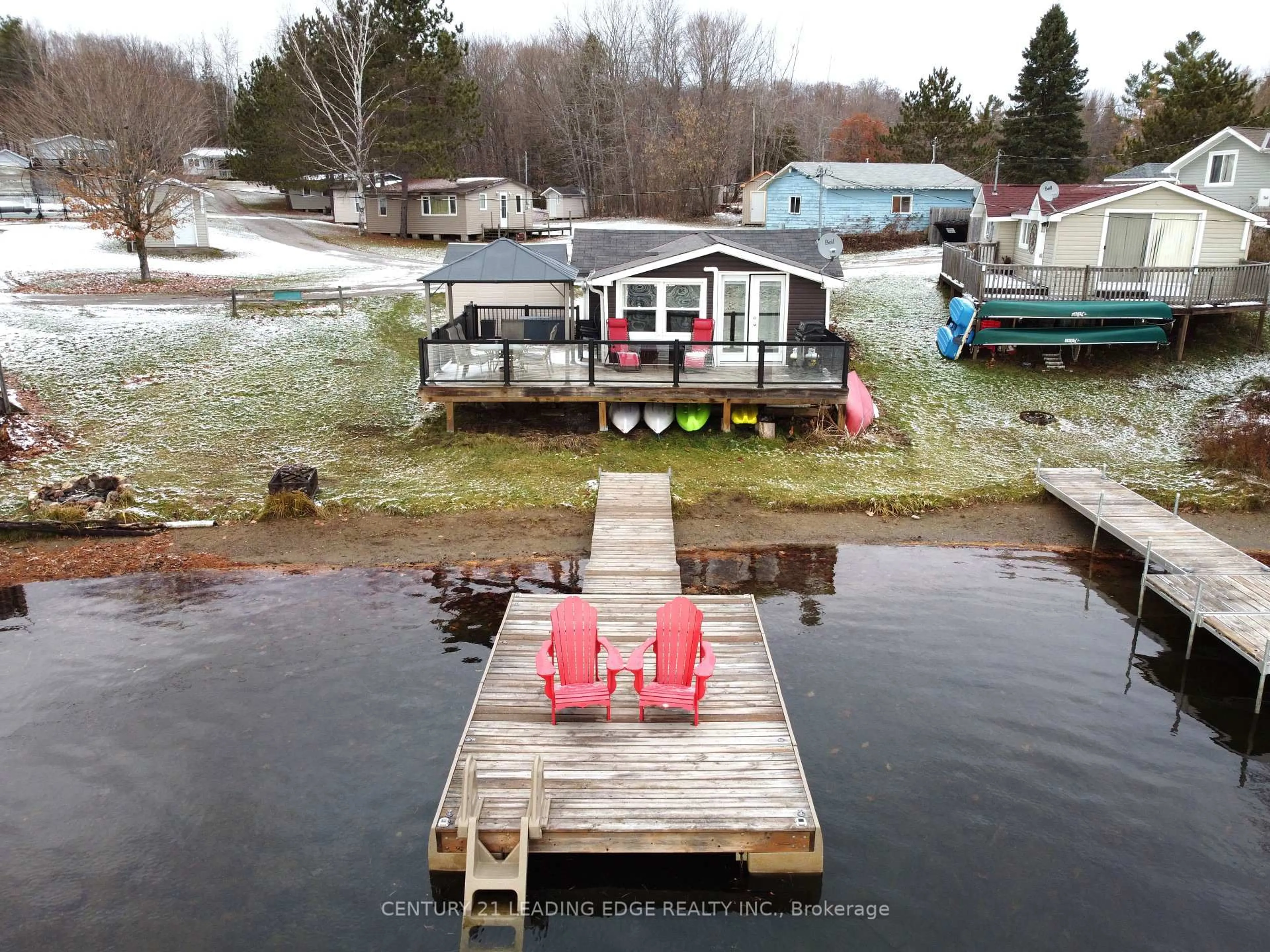 A pic from outside/outdoor area/front of a property/back of a property/a pic from drone, water/lake/river/ocean view for 1043 Lobo Dr #24, Minden Hills Ontario K0M 2K0