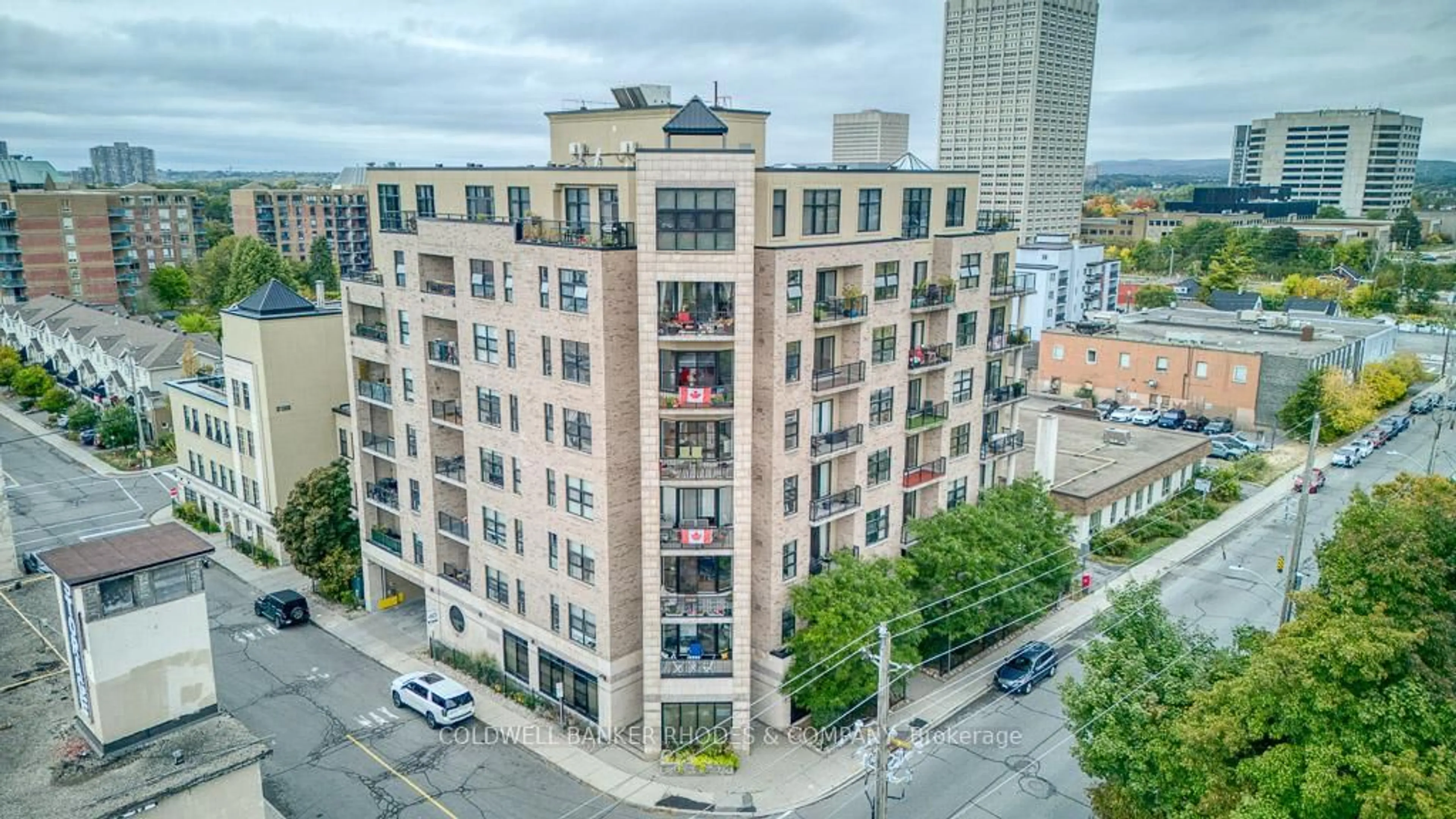 A pic from outside/outdoor area/front of a property/back of a property/a pic from drone, city buildings view from balcony for 320 Parkdale Ave #405, Ottawa Ontario K1Y 4X9
