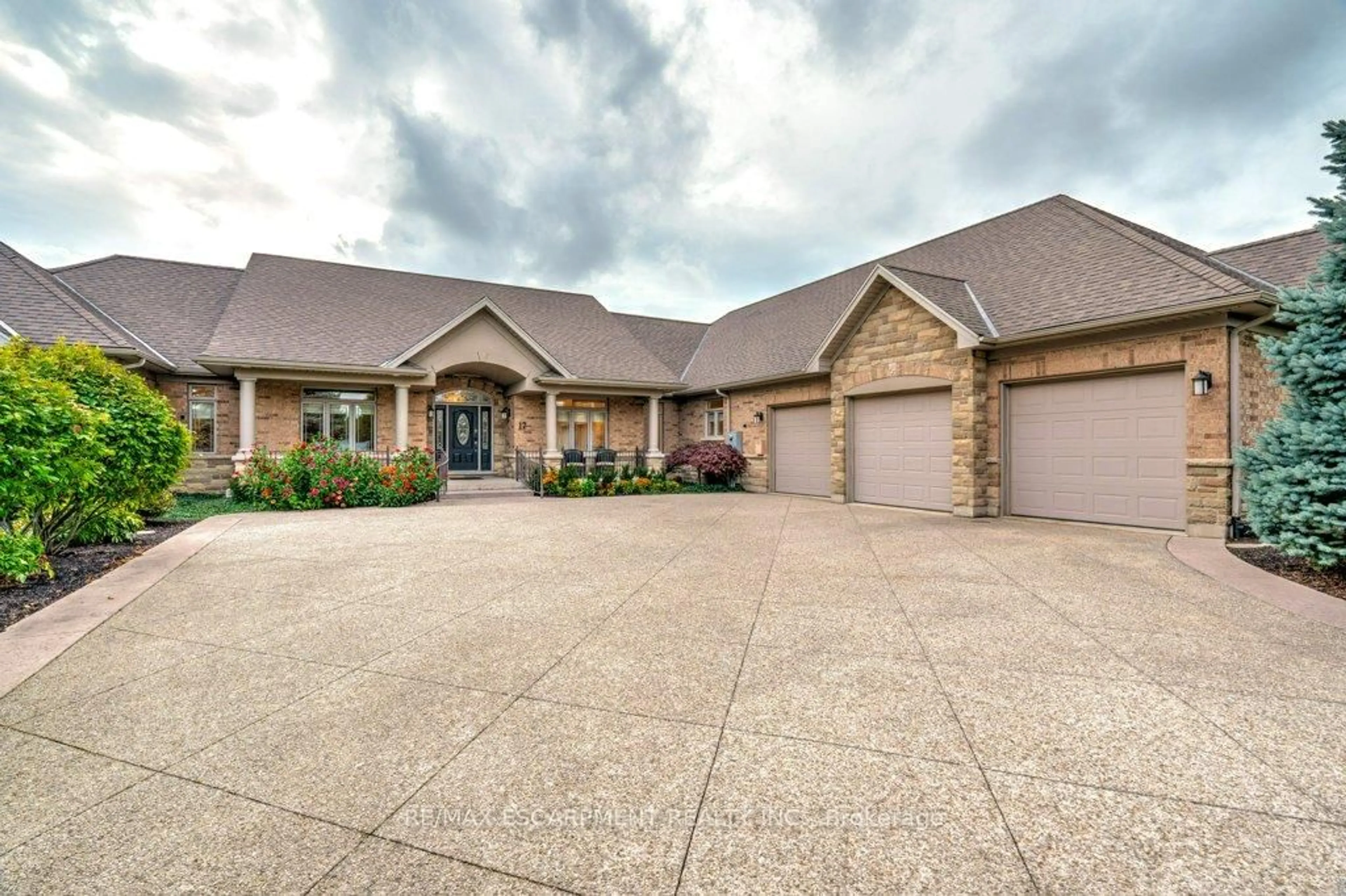 Home with brick exterior material, street for 17 TEWS Lane, Hamilton Ontario L9H 7N4