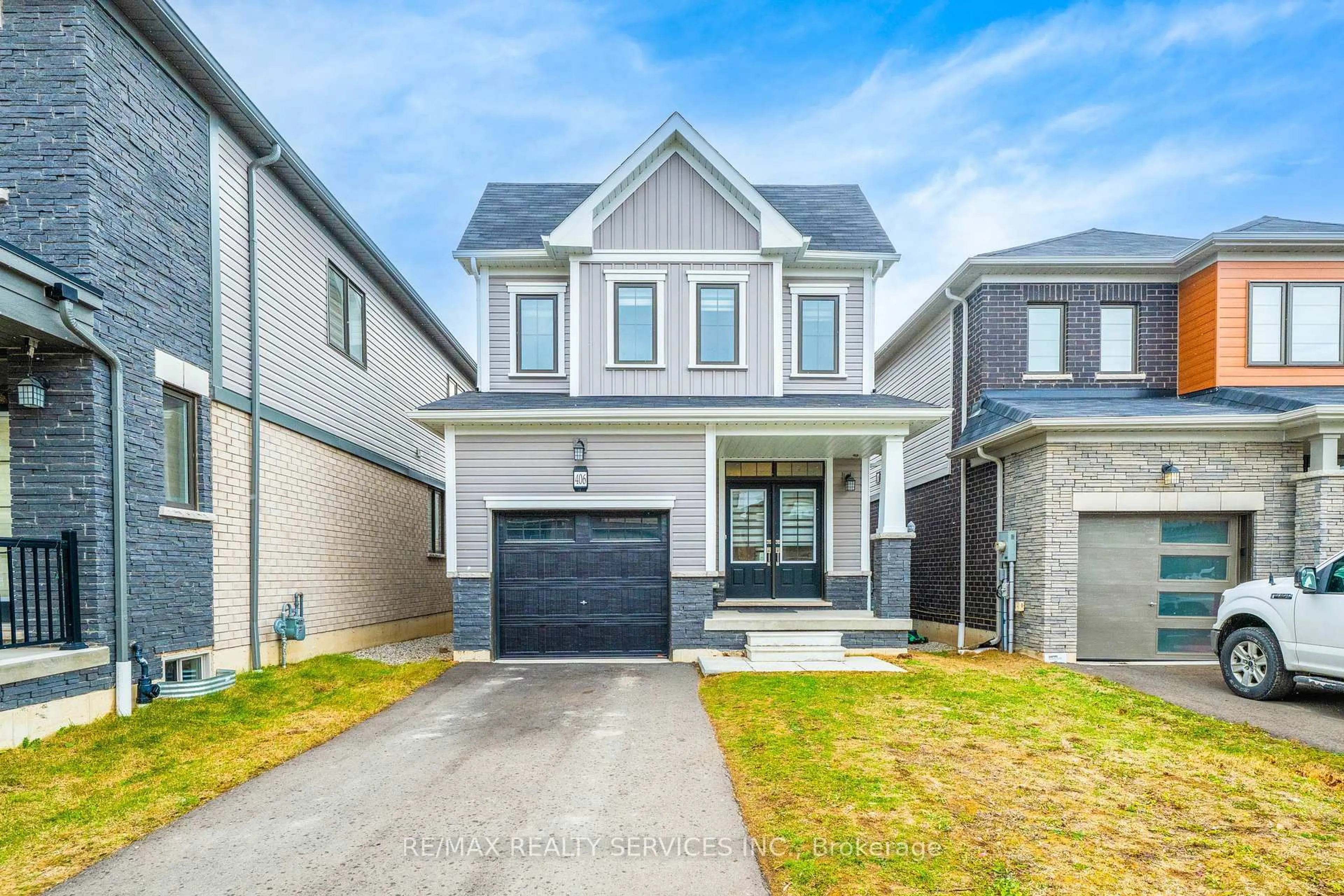 Home with brick exterior material, street for 406 Dolman St, Woolwich Ontario N0B 1M0