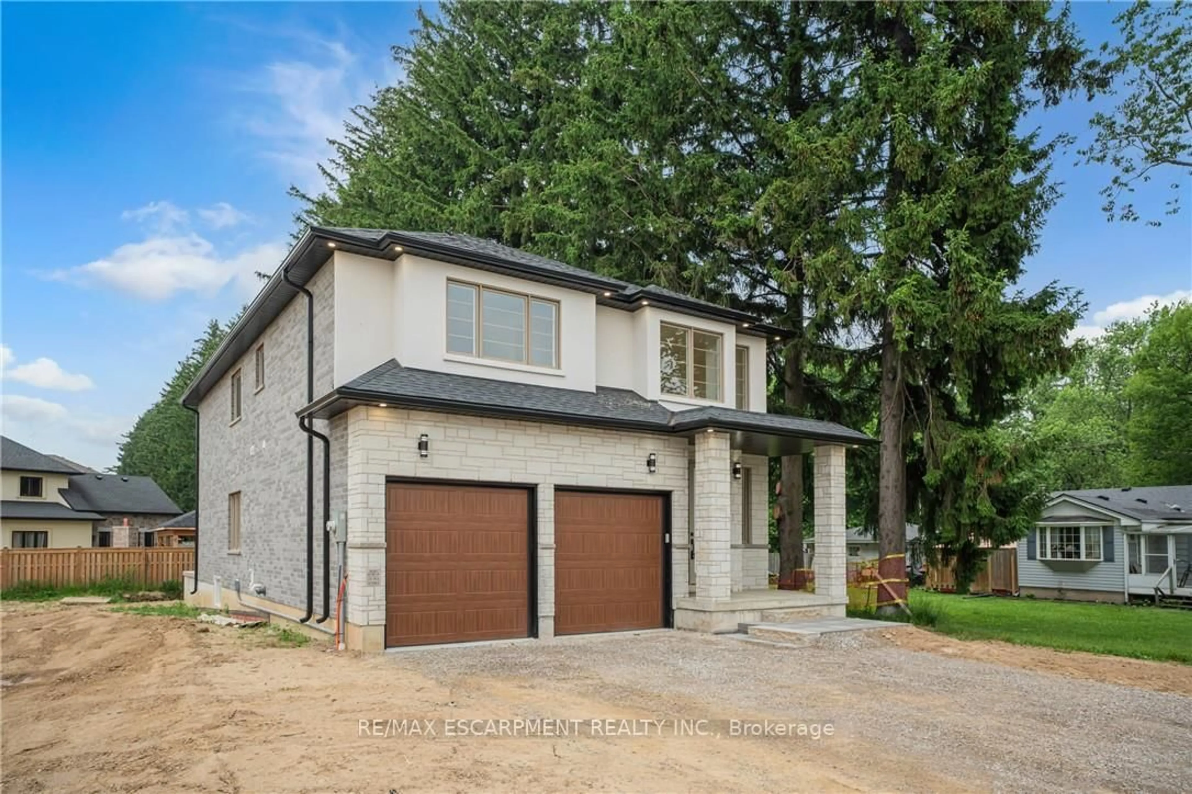 Home with brick exterior material, street for 386 Southcote Rd, Hamilton Ontario L9G 2W3