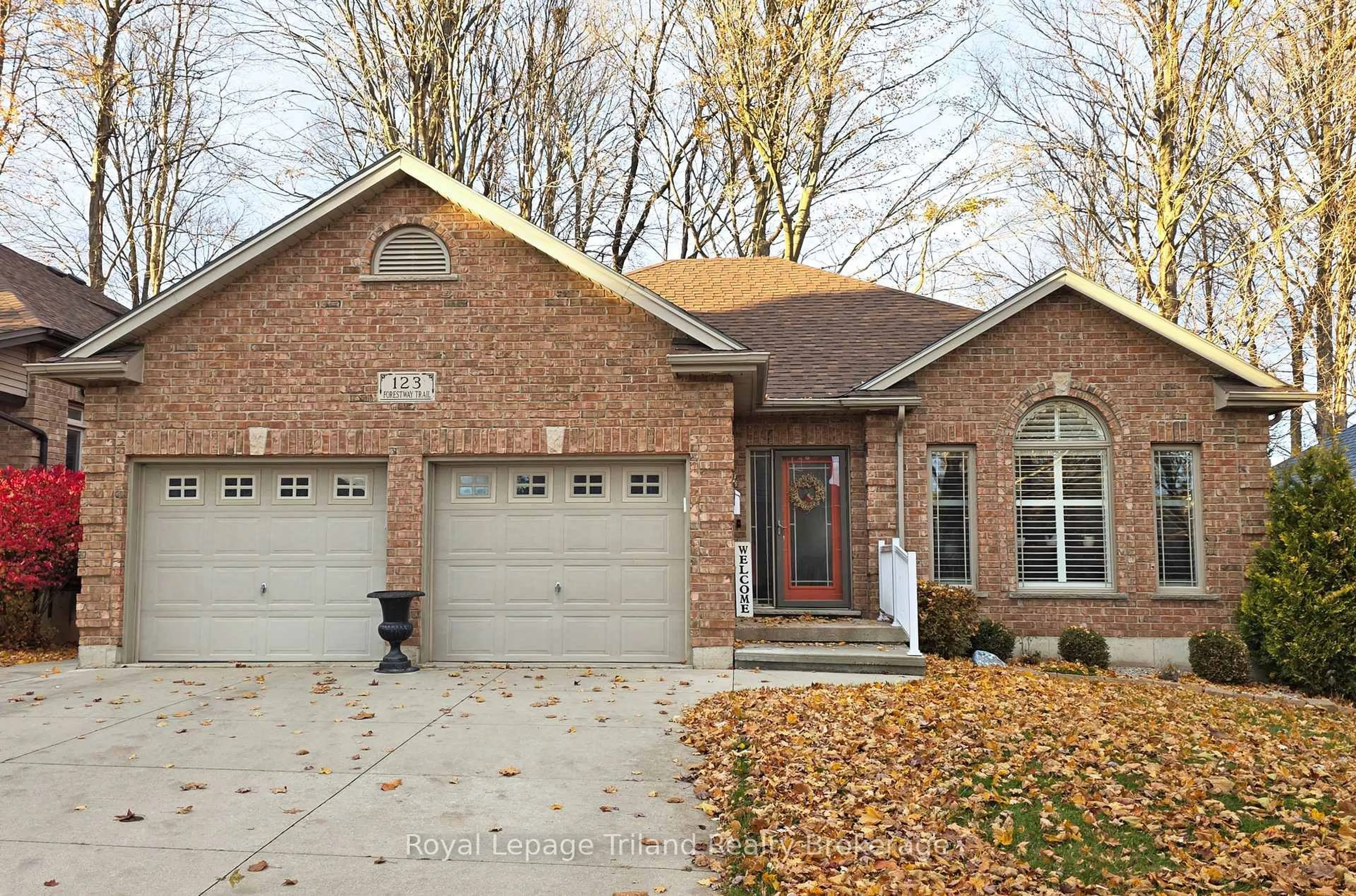 Home with brick exterior material, street for 123 Forestway Tr, Woodstock Ontario N4S 9A7