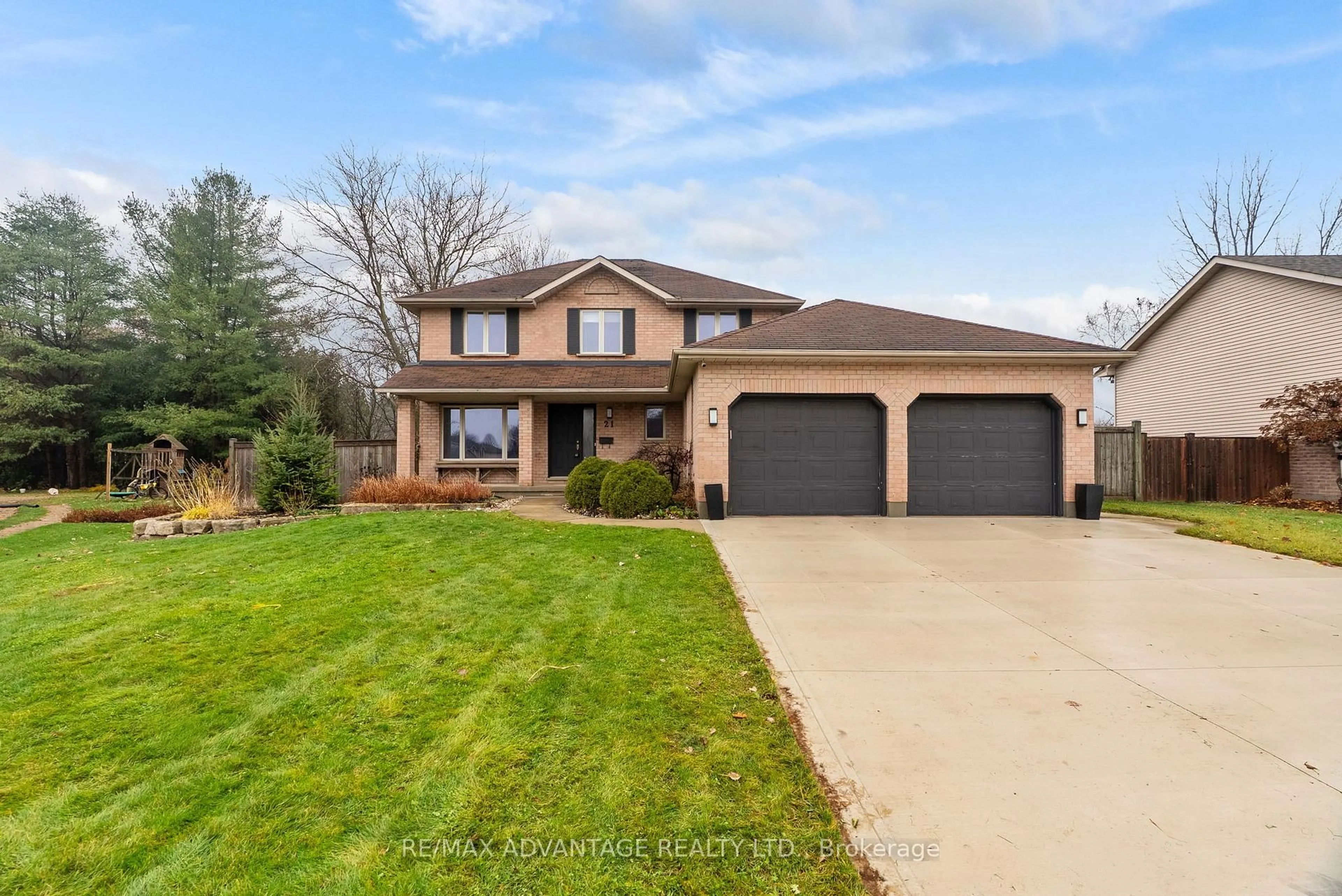 Home with brick exterior material, street for 21 Village Gate Cres, Thames Centre Ontario N0L 1G3