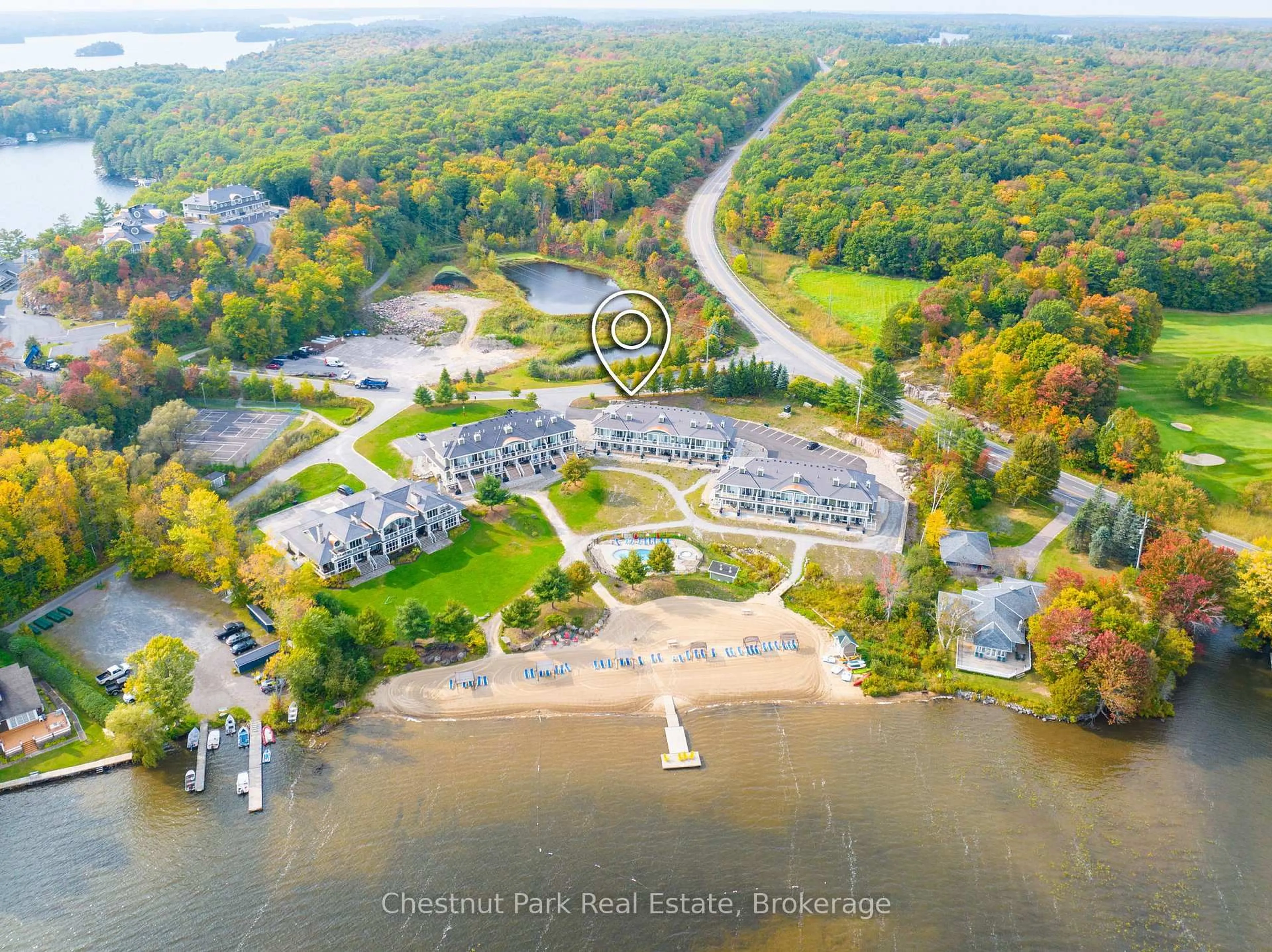 A pic from outside/outdoor area/front of a property/back of a property/a pic from drone, water/lake/river/ocean view for 1869 Muskoka Rd 118 West Rd #BHVB201, Muskoka Lakes Ontario P1L 1W8