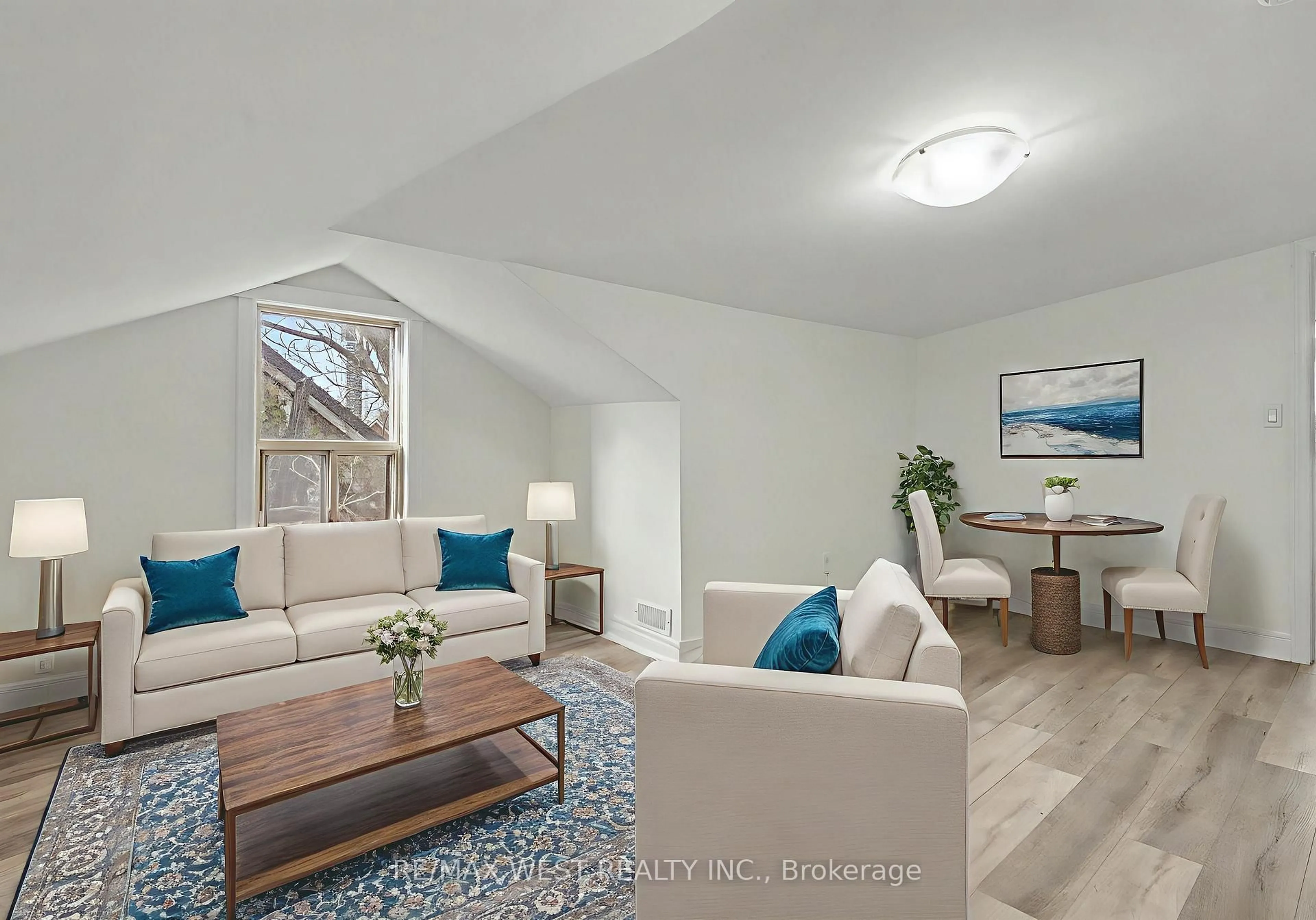 Living room with furniture, wood/laminate floor for 287 Hunter St, Hamilton Ontario L8N 1N5