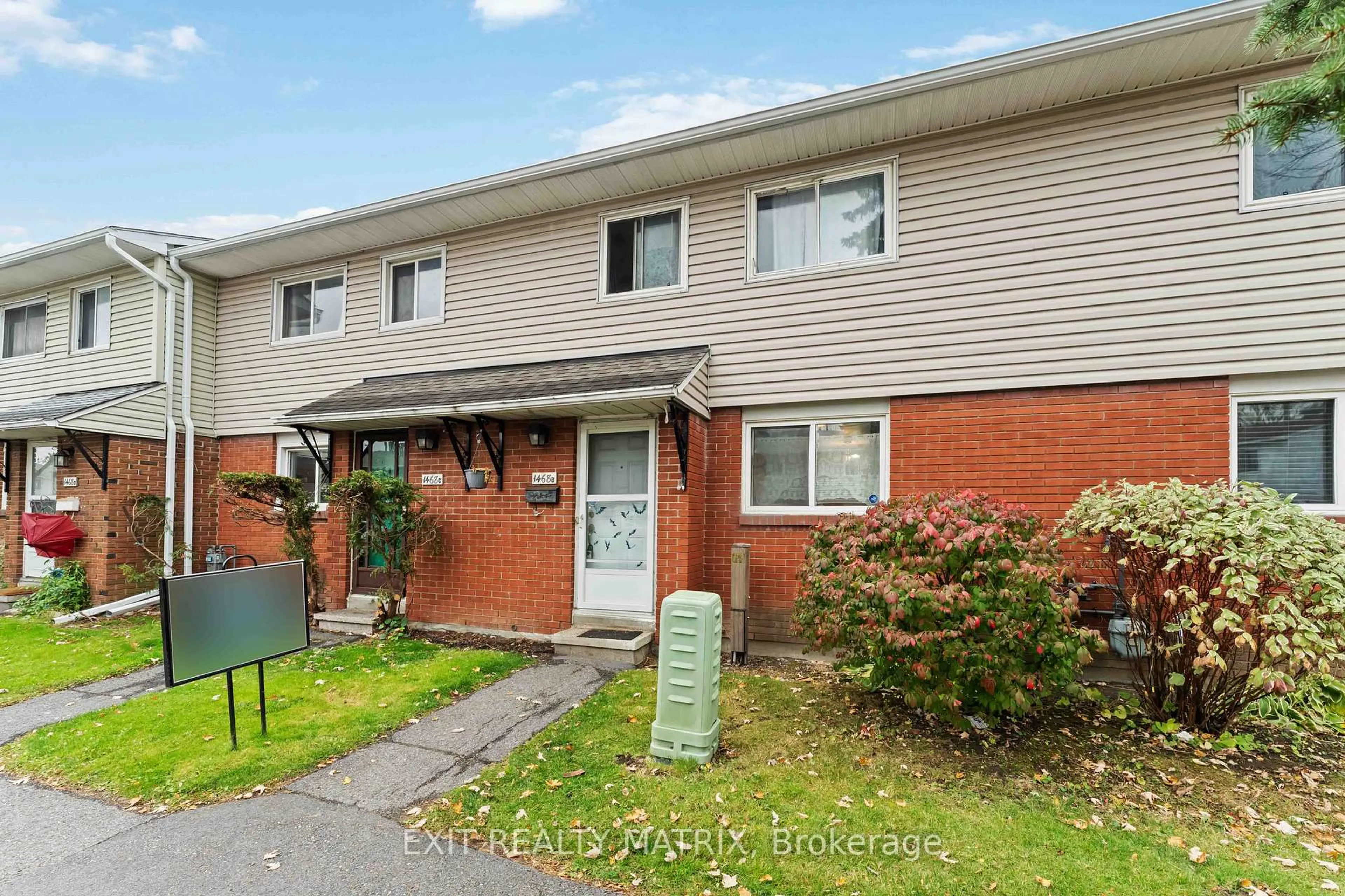 A pic from outside/outdoor area/front of a property/back of a property/a pic from drone, street for 1468 Heatherington Rd #B, Ottawa Ontario K1V 6S1