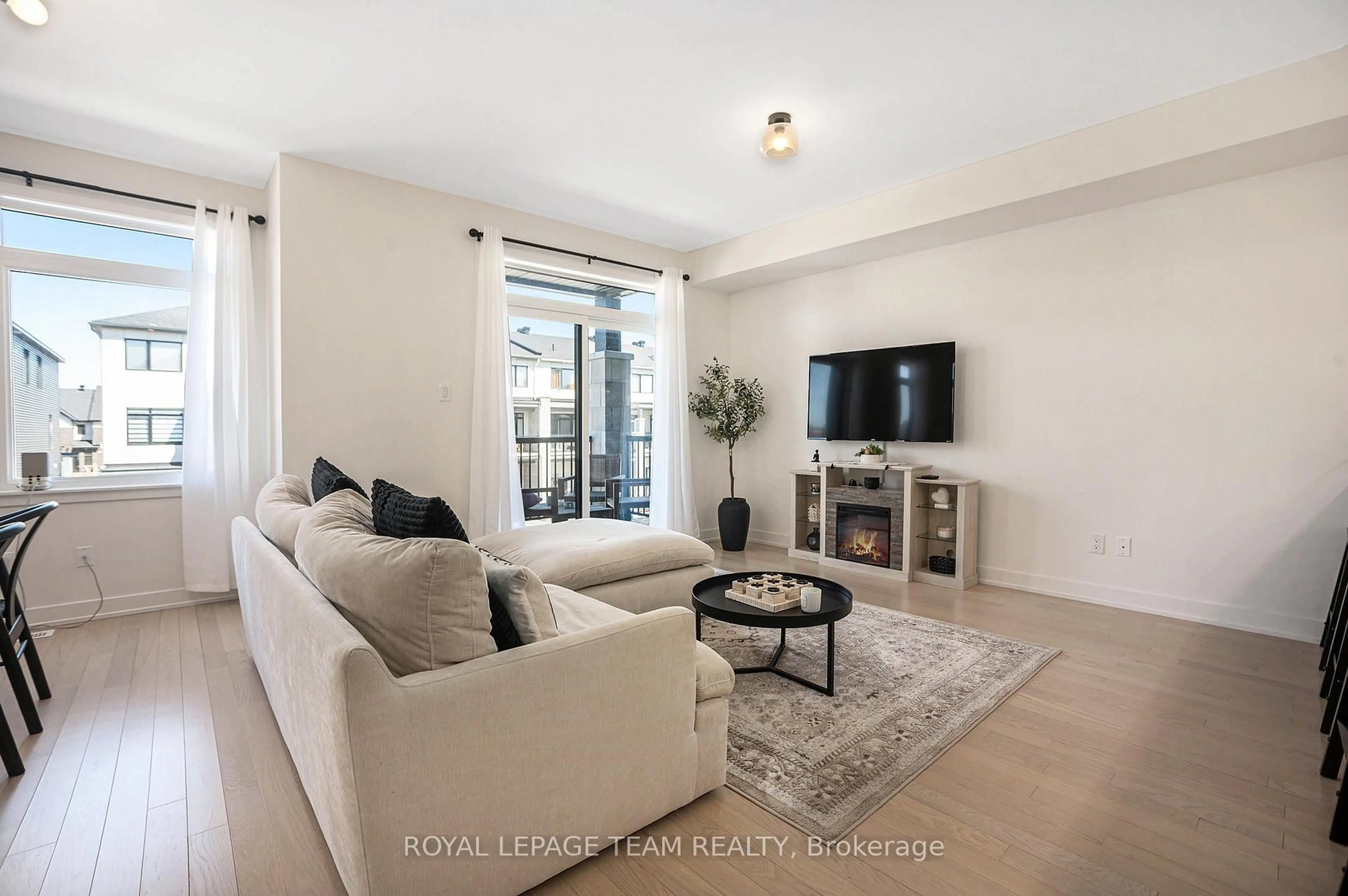 Living room with furniture, unknown for 58 Arinto Pl, Ottawa Ontario K2S 2R7