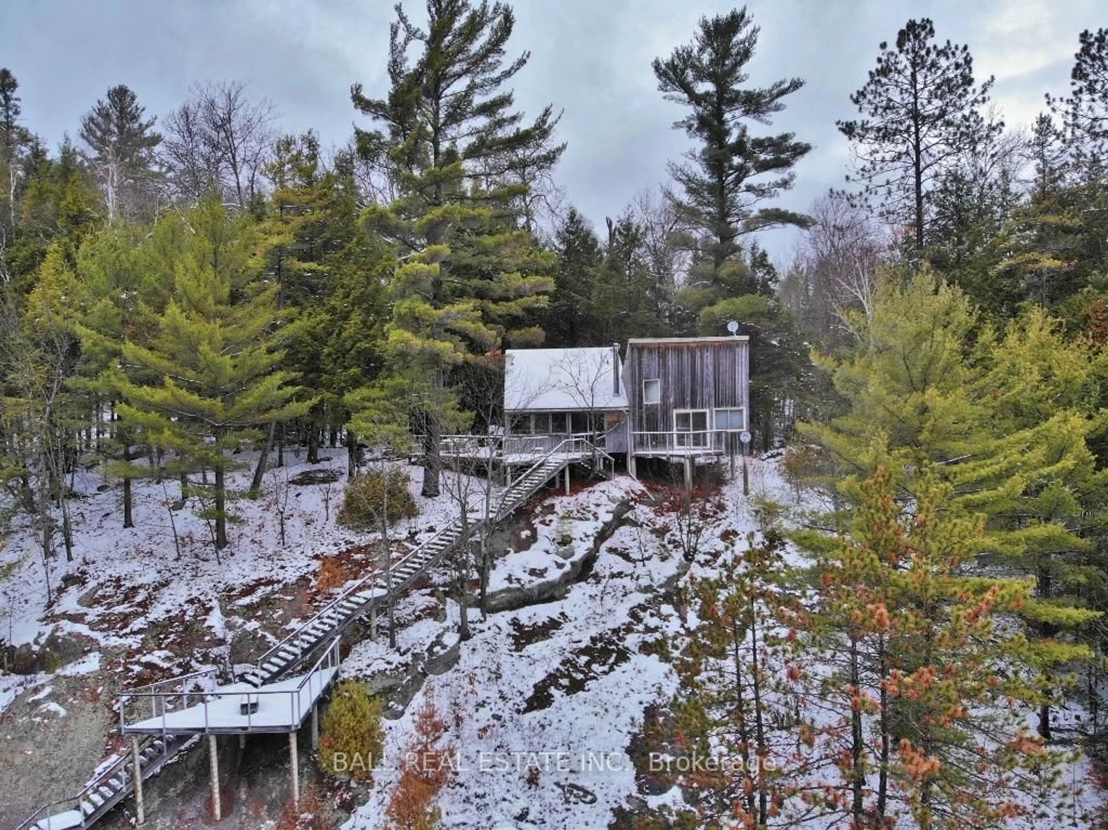 A pic from outside/outdoor area/front of a property/back of a property/a pic from drone, forest/trees view for 11 Sumac Crt, Bancroft Ontario K0L 1C0