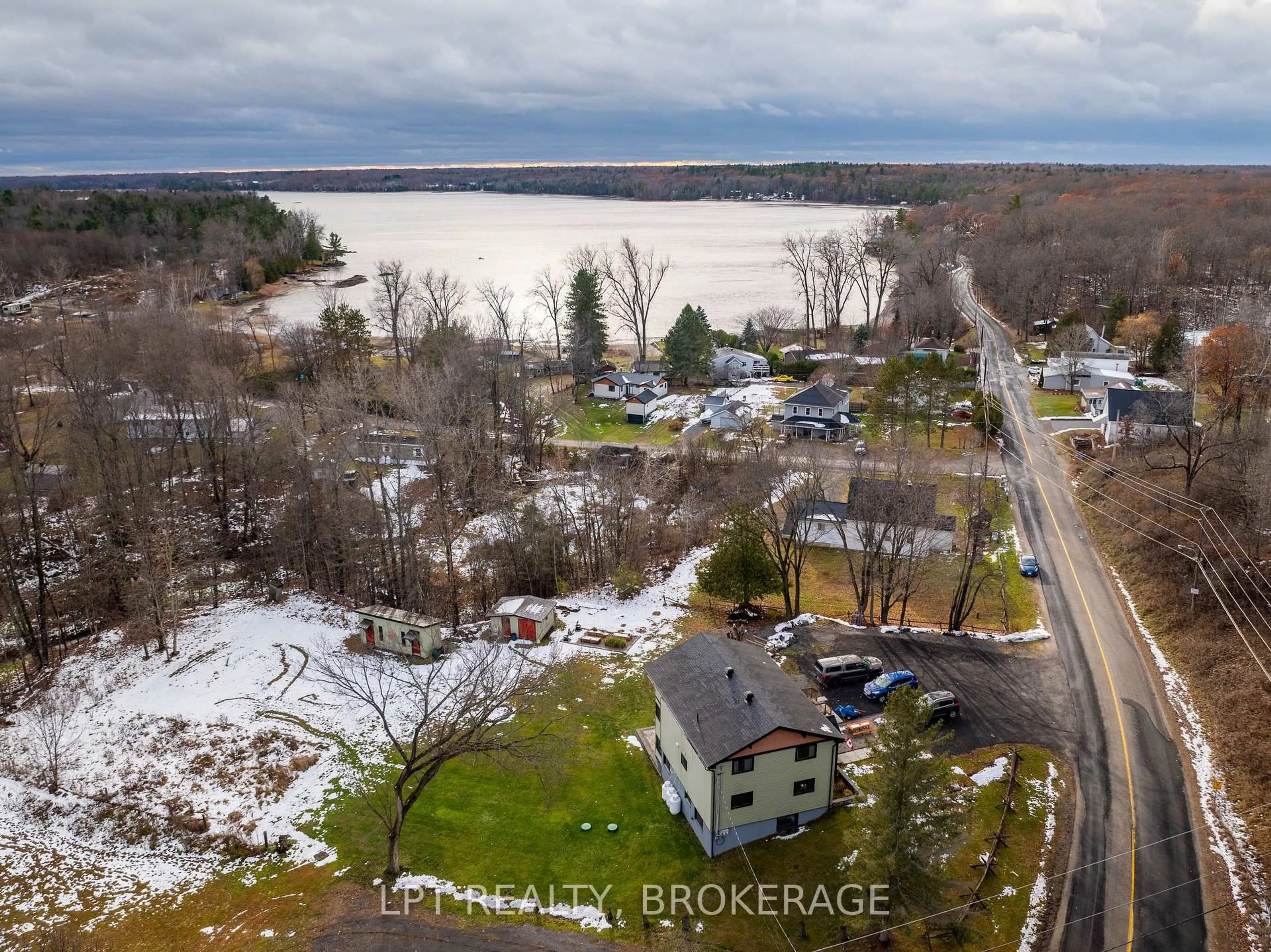 A pic from outside/outdoor area/front of a property/back of a property/a pic from drone, water/lake/river/ocean view for 1857 Crow Lake Rd, Maberly Ontario K0H 2B0