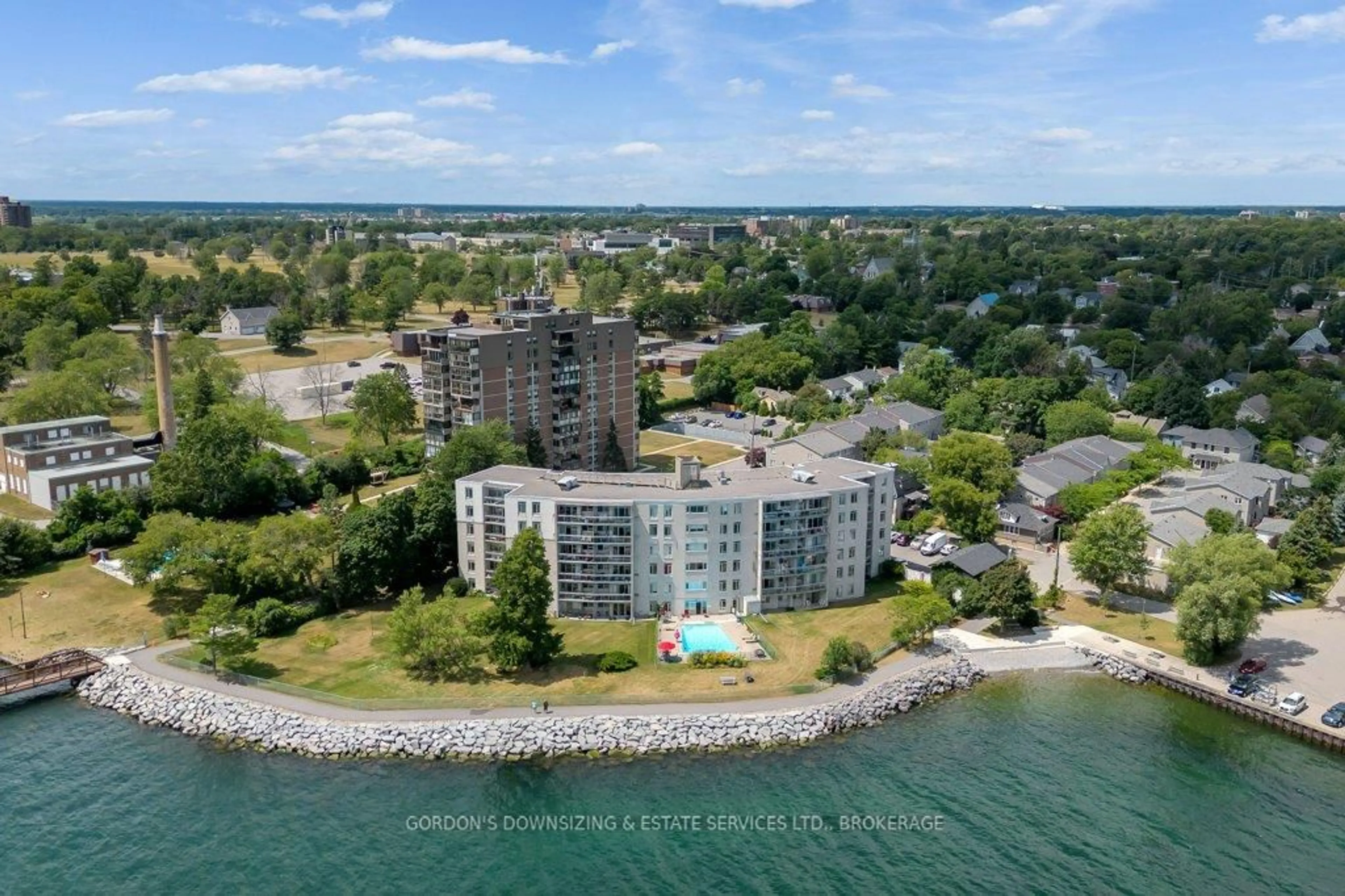 A pic from outside/outdoor area/front of a property/back of a property/a pic from drone, water/lake/river/ocean view for 1 Mowat Ave #205, Kingston Ontario K7M 1J8