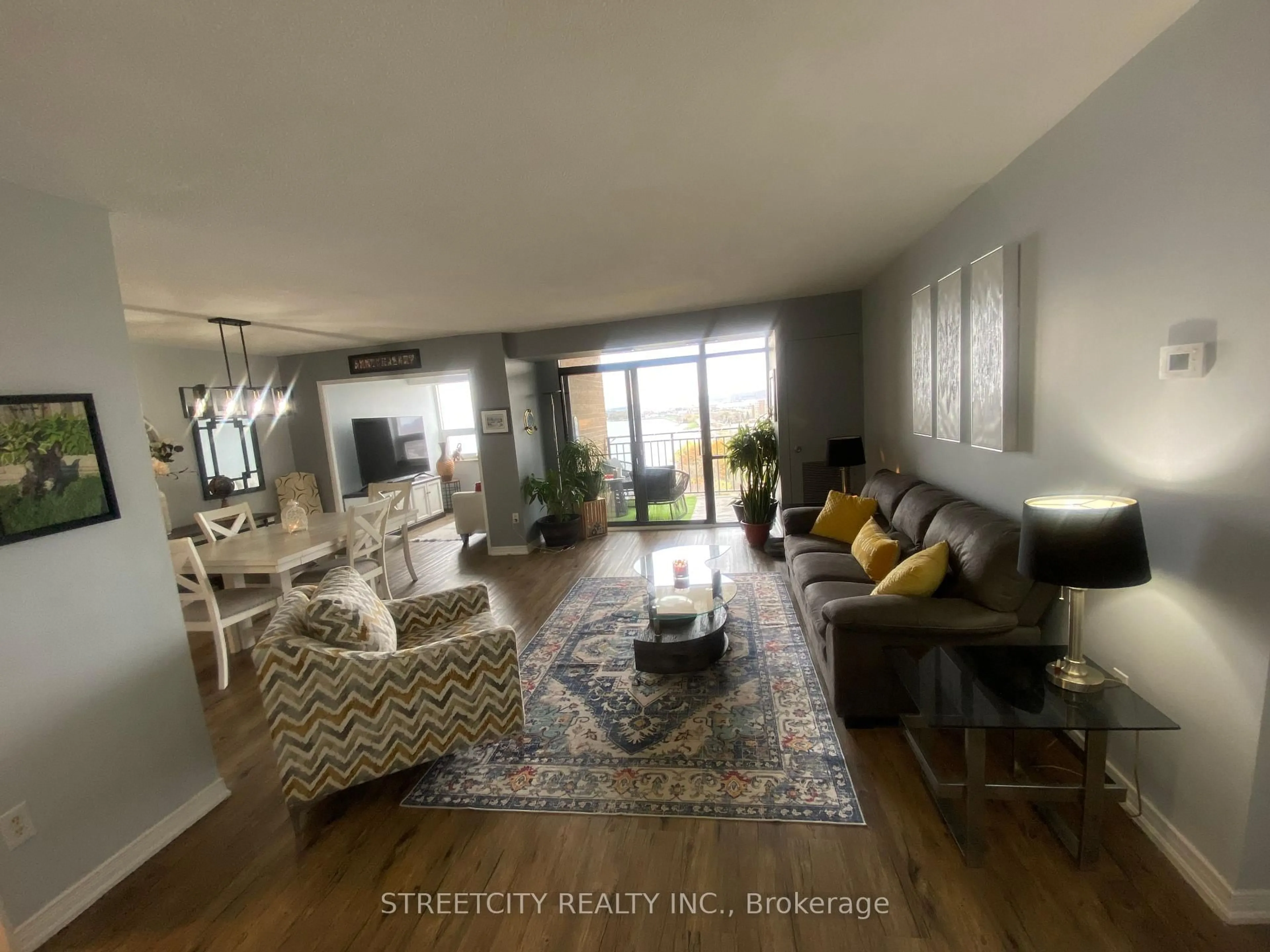 Living room with furniture, unknown for 500 Green Rd #1607, Hamilton Ontario L8E 3M6