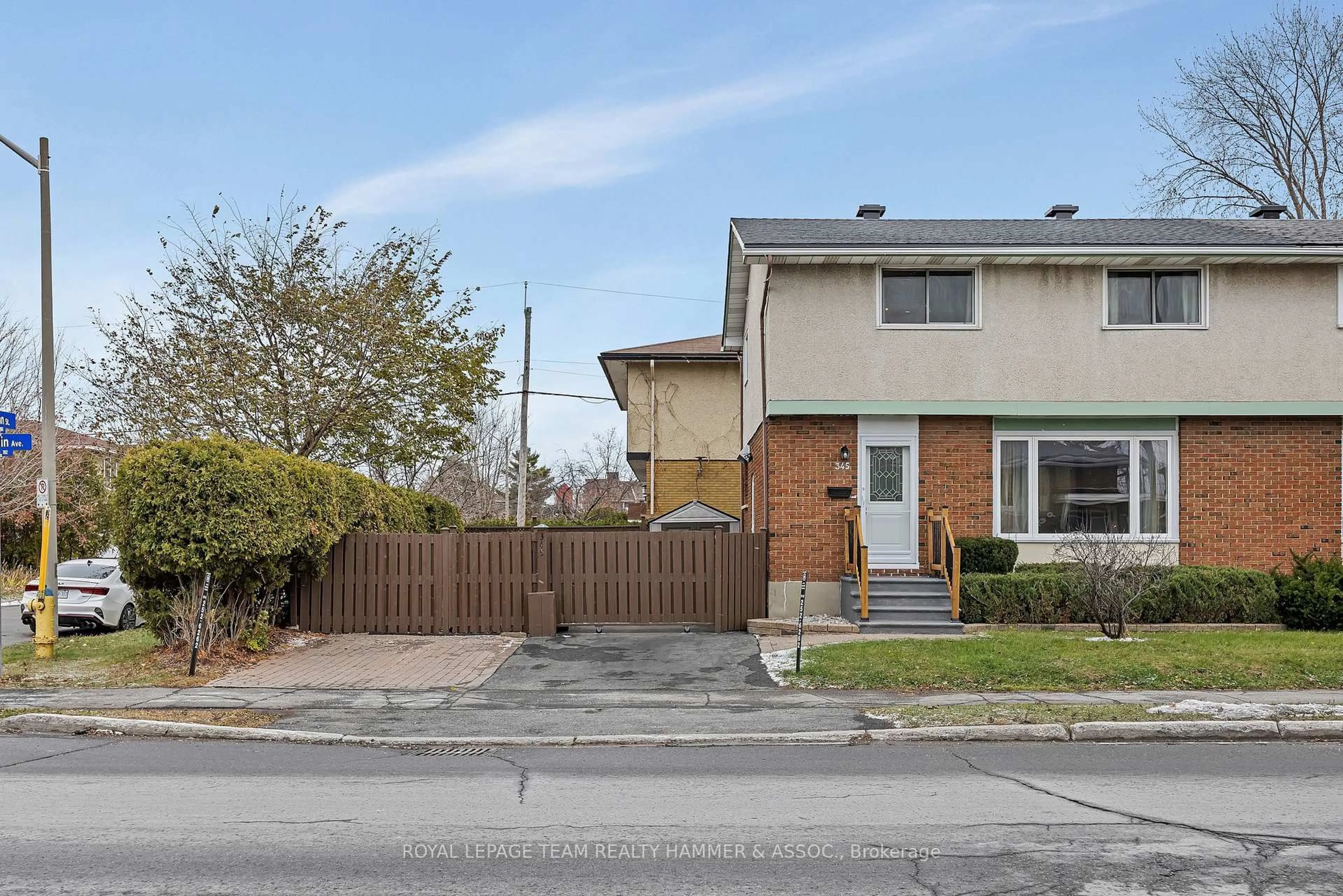 A pic from outside/outdoor area/front of a property/back of a property/a pic from drone, street for 345 Poulin Ave, Ottawa Ontario K2B 5T9