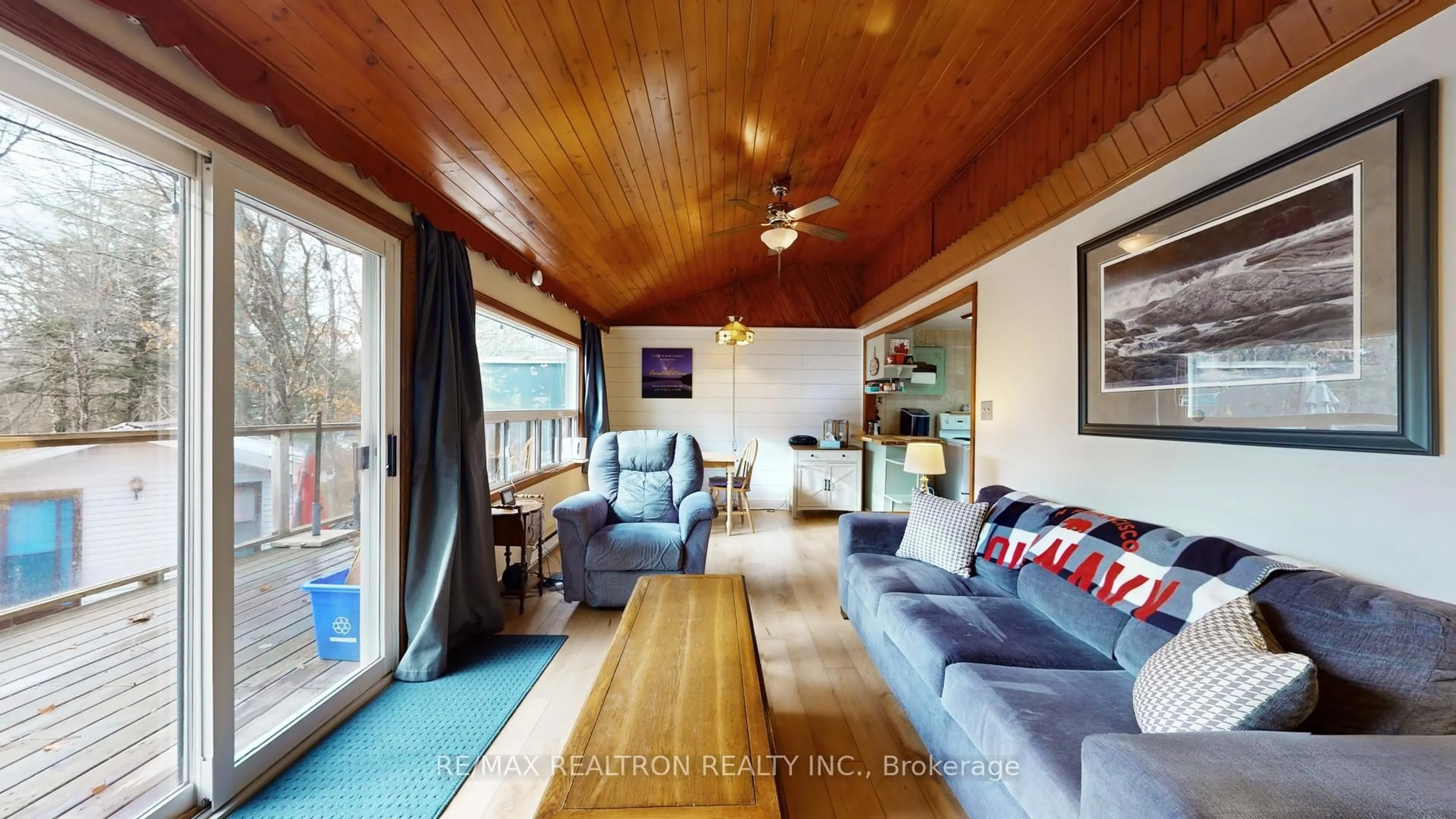 Living room with furniture, wood/laminate floor for 286 Edwina Dr, Trent Lakes Ontario K0M 1A0