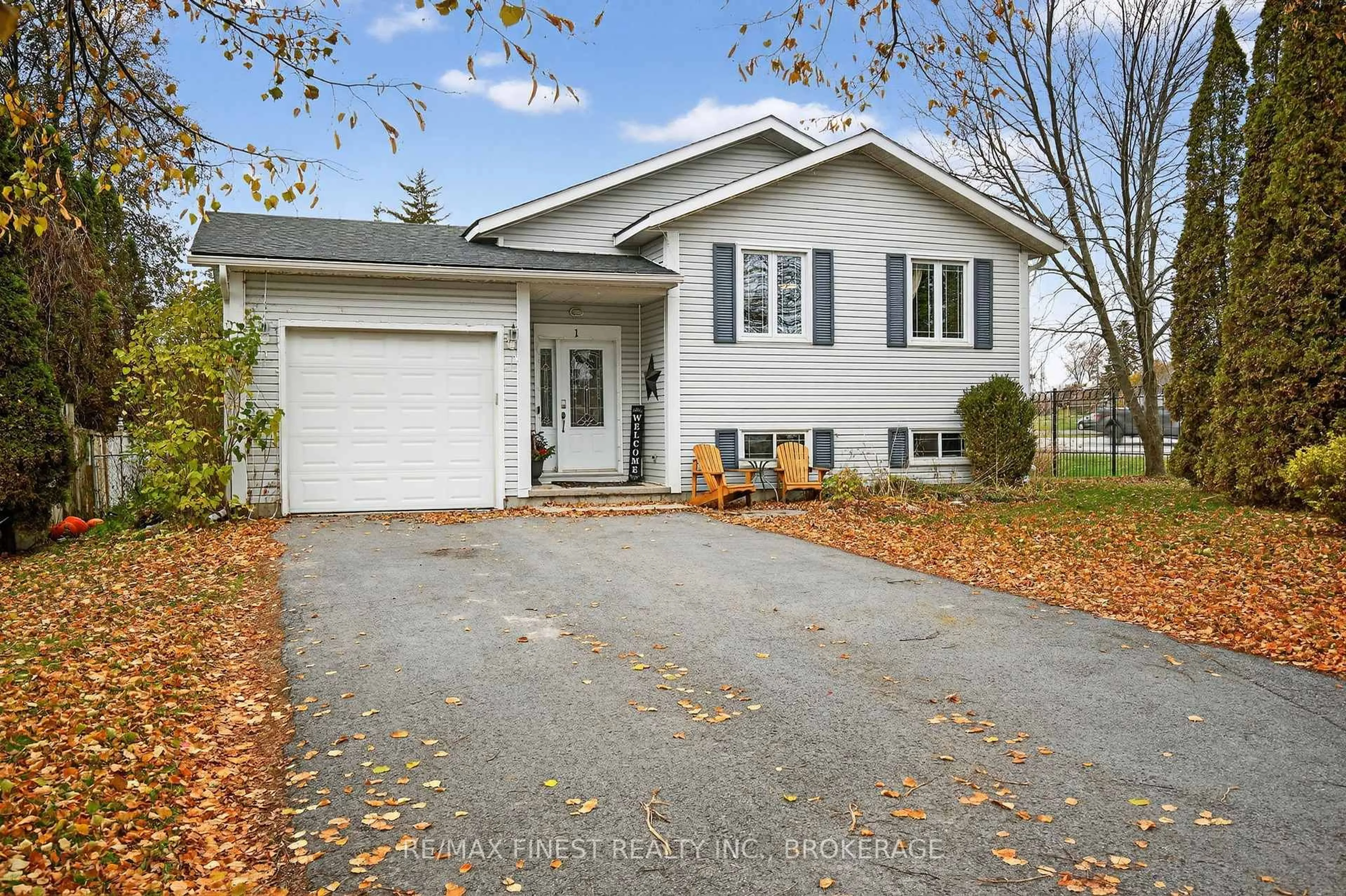 Home with vinyl exterior material, street for 1 Heritage Dr, Bath Ontario K0H 1G0