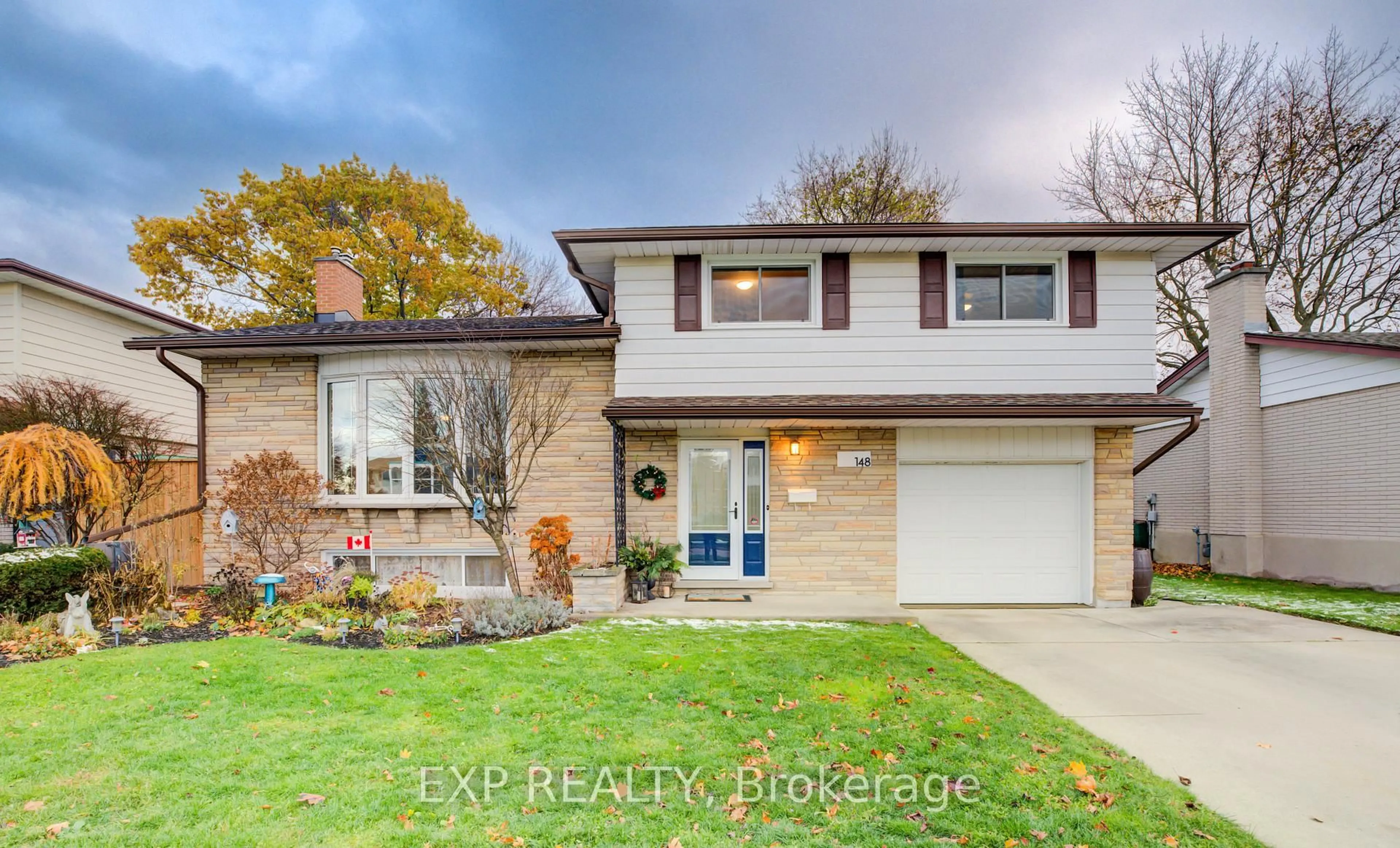 Home with brick exterior material, street for 148 Strathcona Cres, Kitchener Ontario N2B 2W9