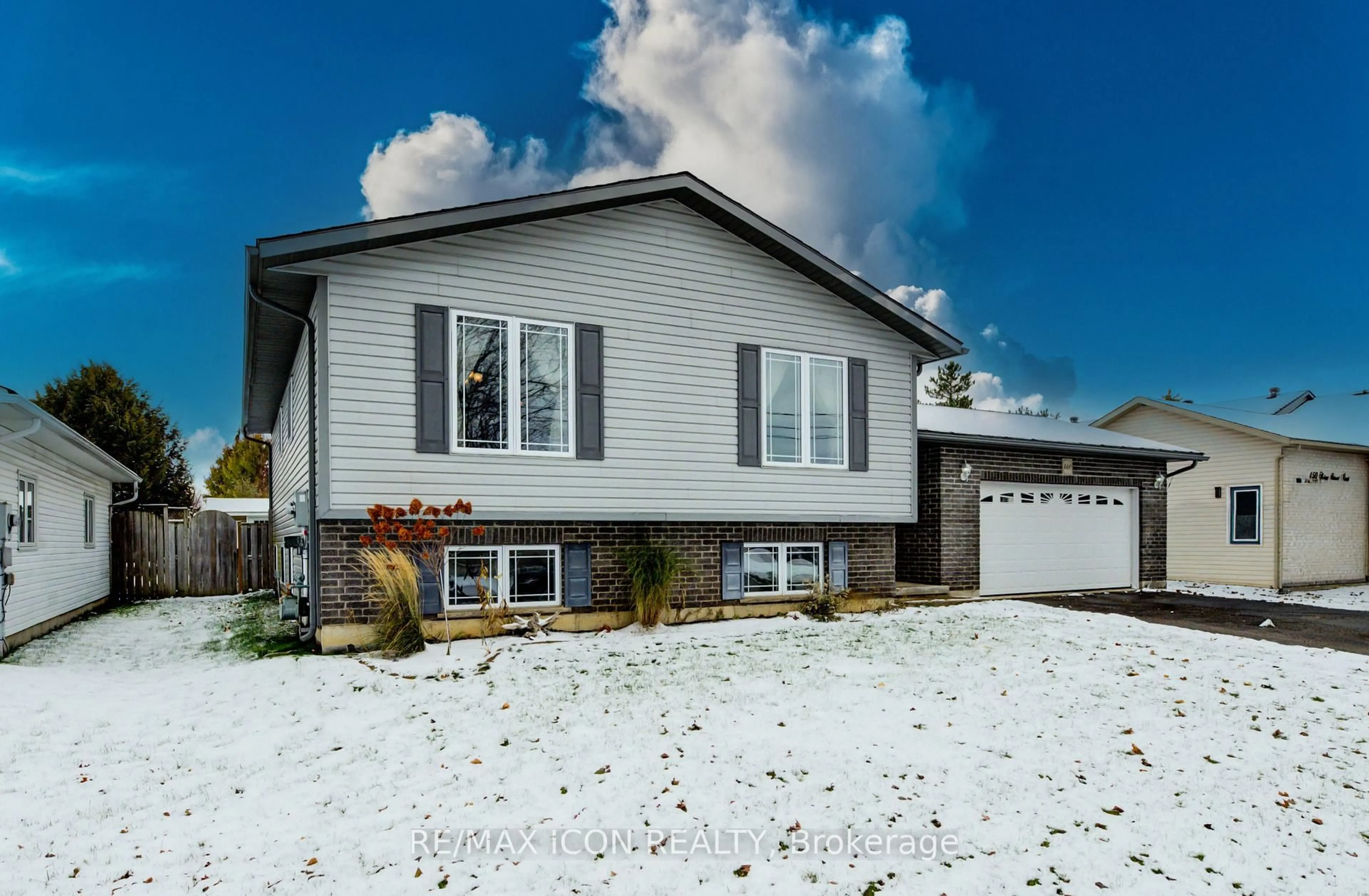 Home with vinyl exterior material, street for 460 King St, Wellington North Ontario N0G 2L2