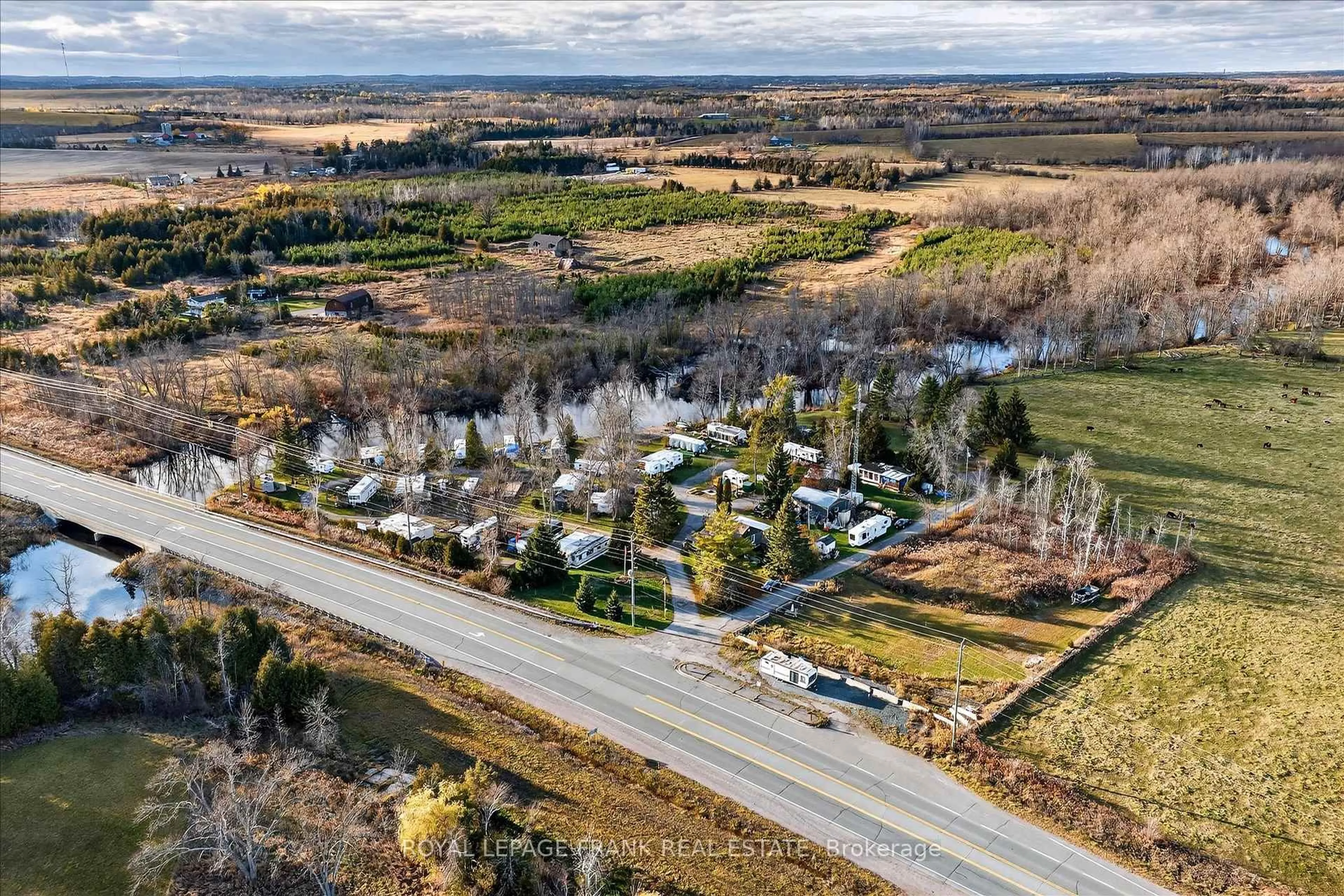 A pic from outside/outdoor area/front of a property/back of a property/a pic from drone, street for 2140 Highway 7, Otonabee-South Monaghan Ontario K0L 2B0