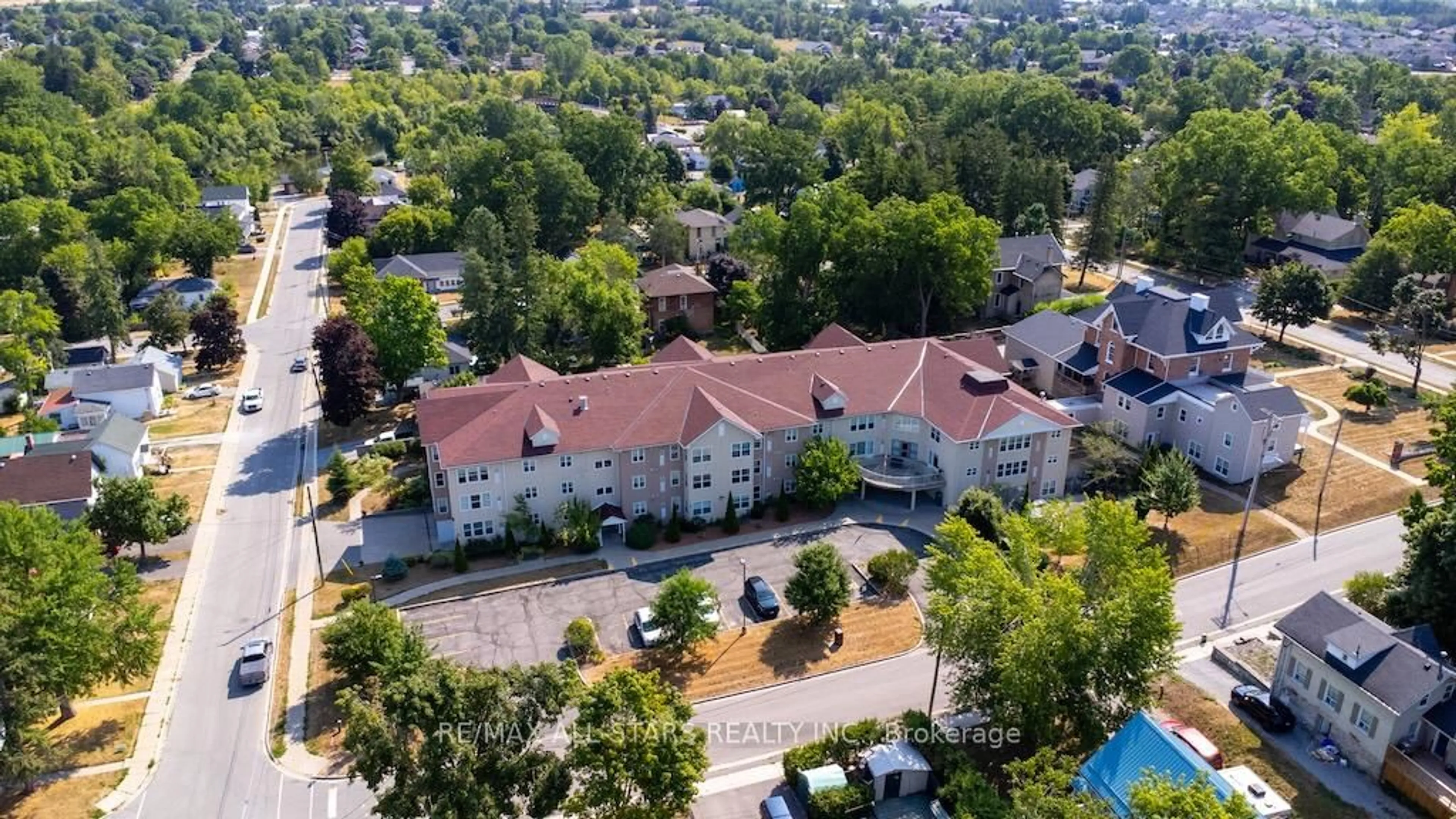 A pic from outside/outdoor area/front of a property/back of a property/a pic from drone, unknown for 8 Huron St #106, Kawartha Lakes Ontario K9V 6K3
