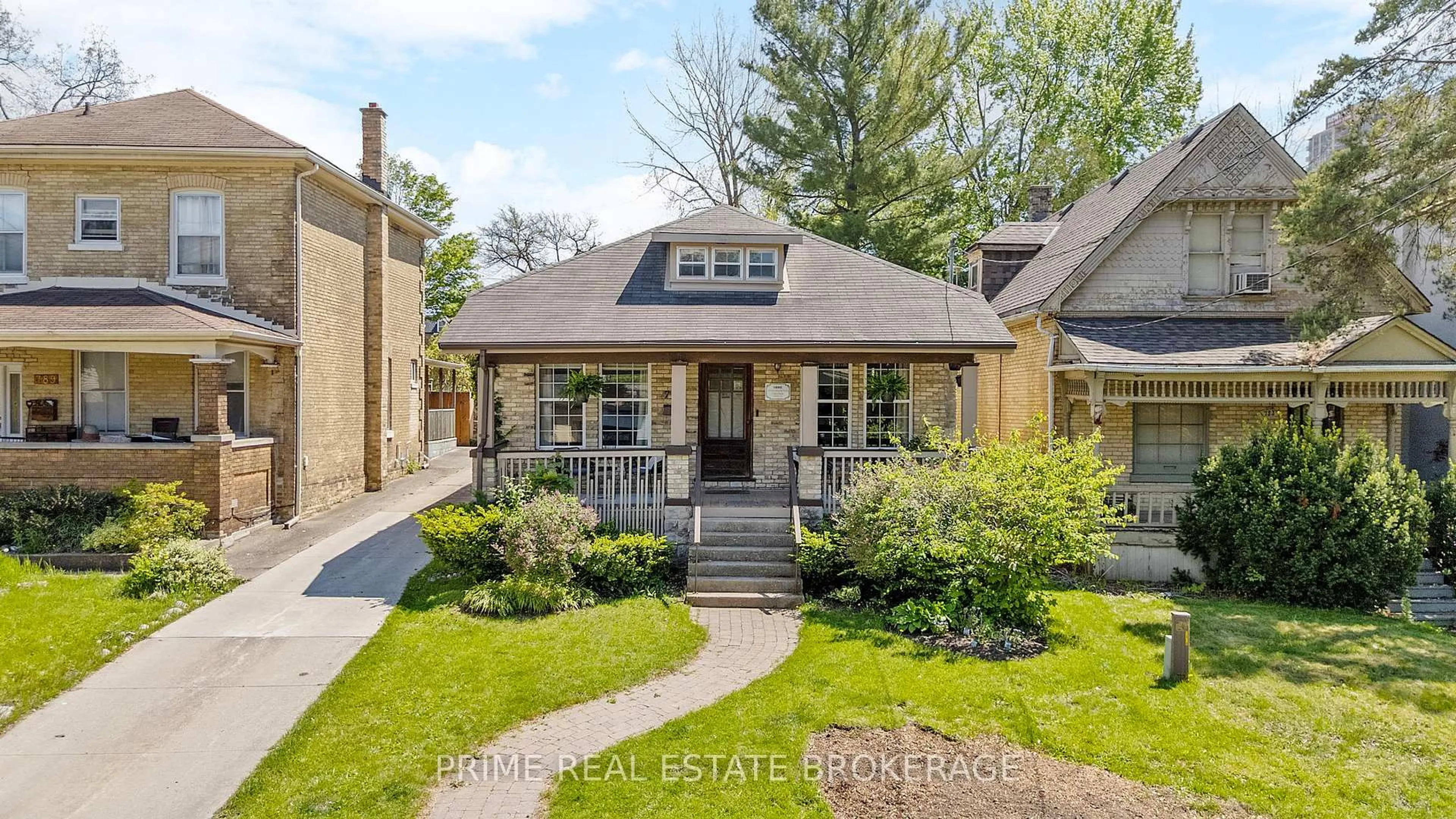 Home with brick exterior material, street for 785 Queens Ave, London East Ontario N5W 3H7