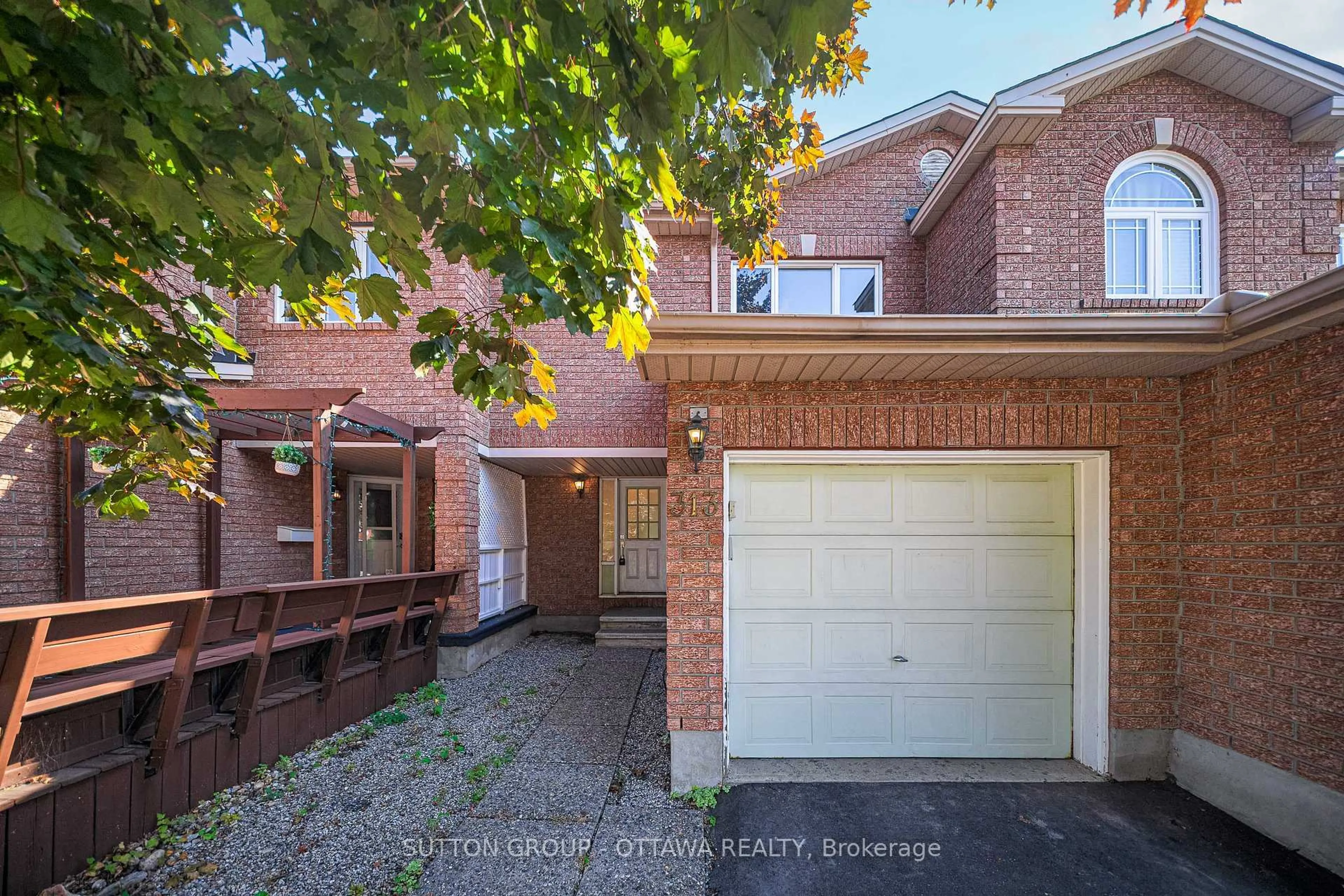 Home with brick exterior material, street for 313 Stoneway Dr, Ottawa Ontario K2G 6E7