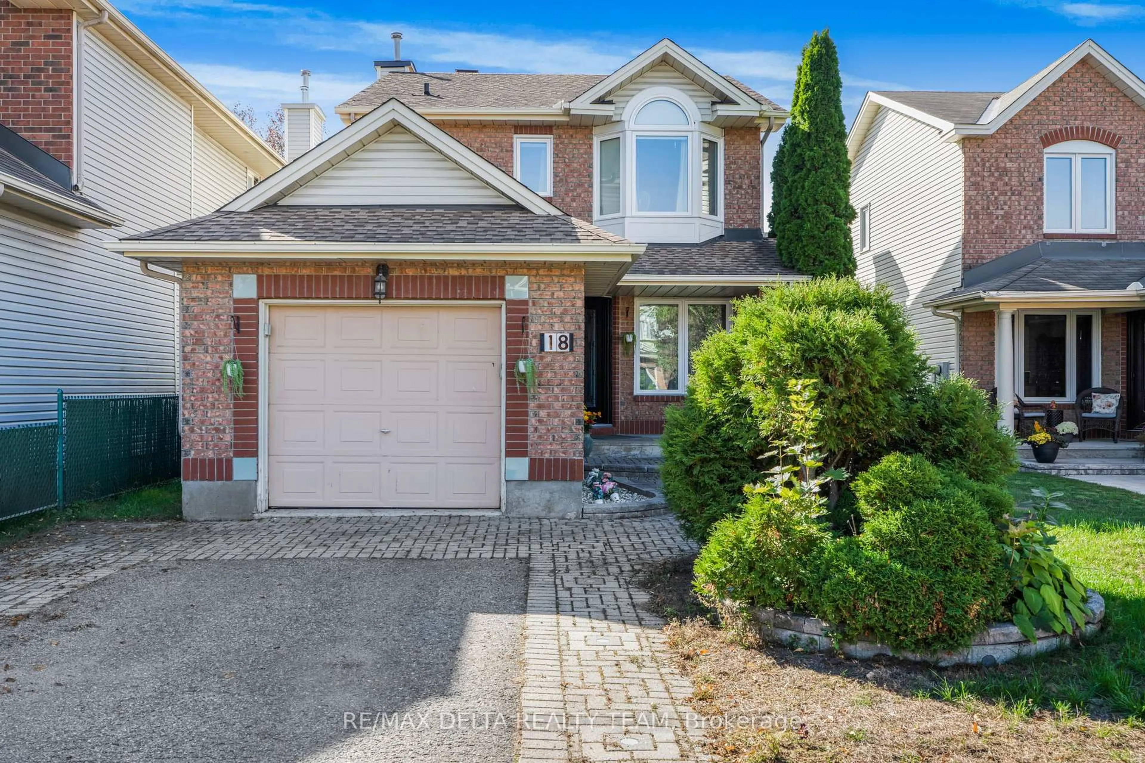 Home with brick exterior material, street for 18 LONGSHIRE Circ, Ottawa Ontario K2J 4K7