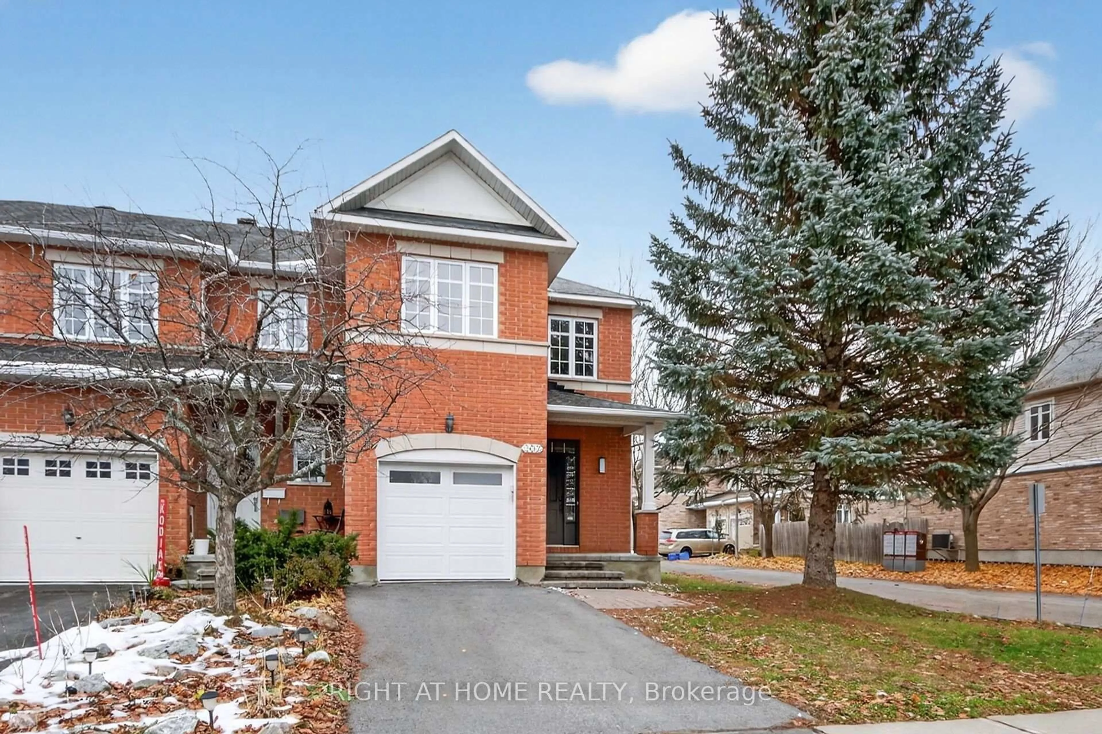 Home with brick exterior material, street for 302 GOLDRIDGE Dr, Ottawa Ontario K2T 1L1