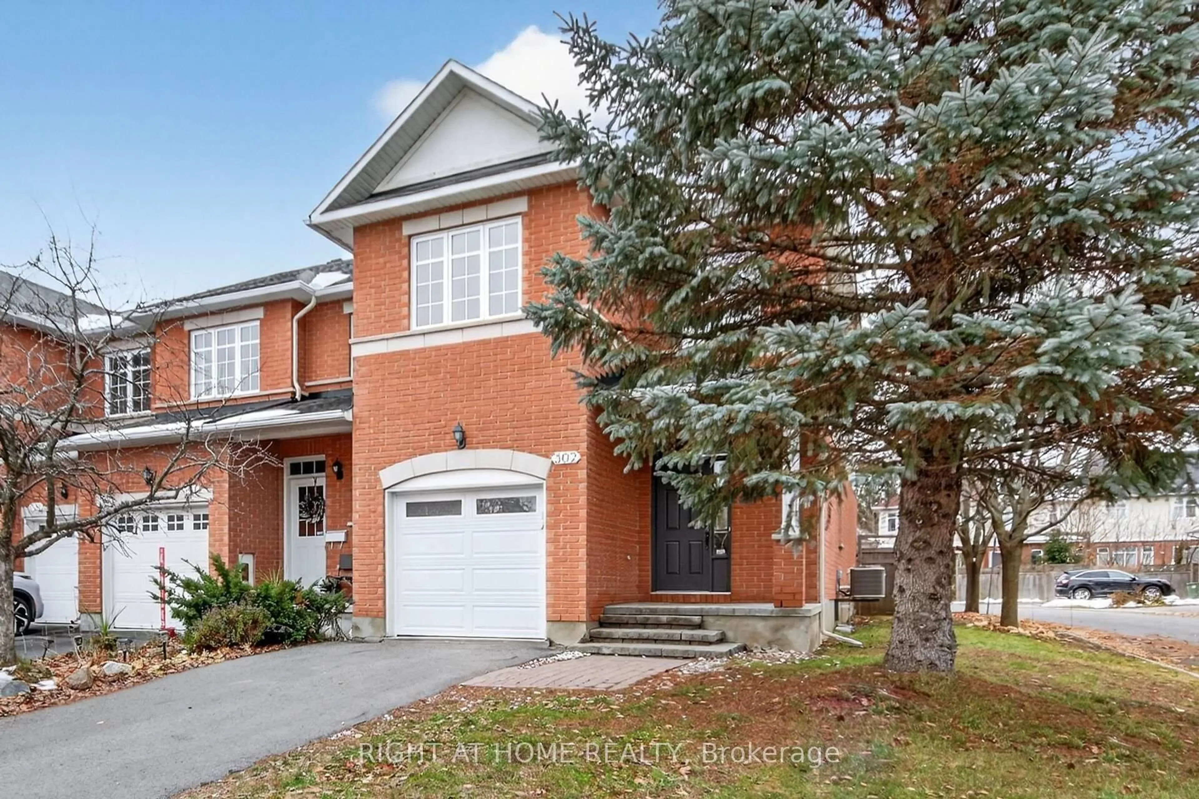 Home with brick exterior material, street for 302 GOLDRIDGE Dr, Ottawa Ontario K2T 1L1