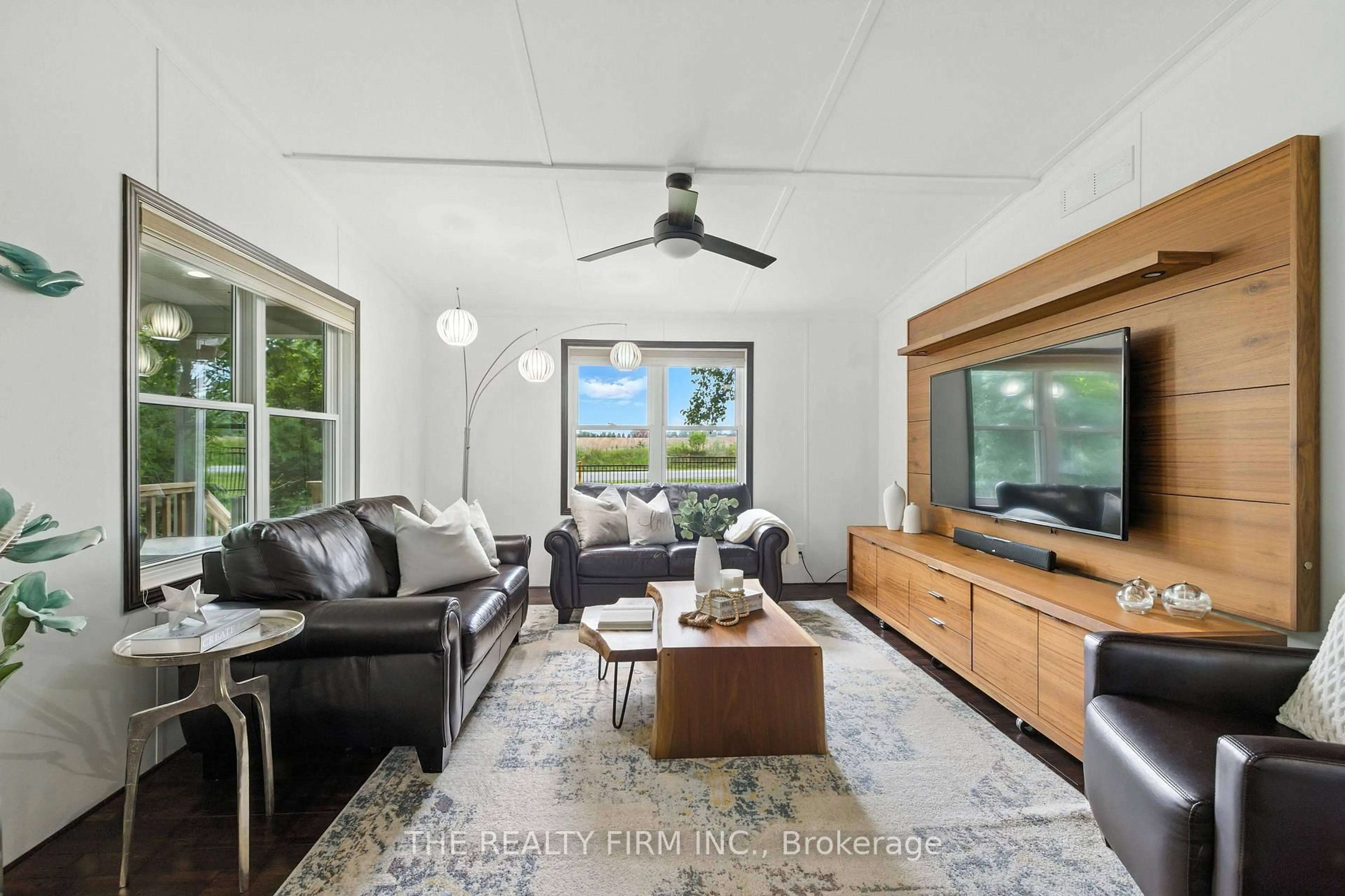 Living room with furniture, unknown for 22790 Amiens Rd #1, Middlesex Centre Ontario N0L 1R0