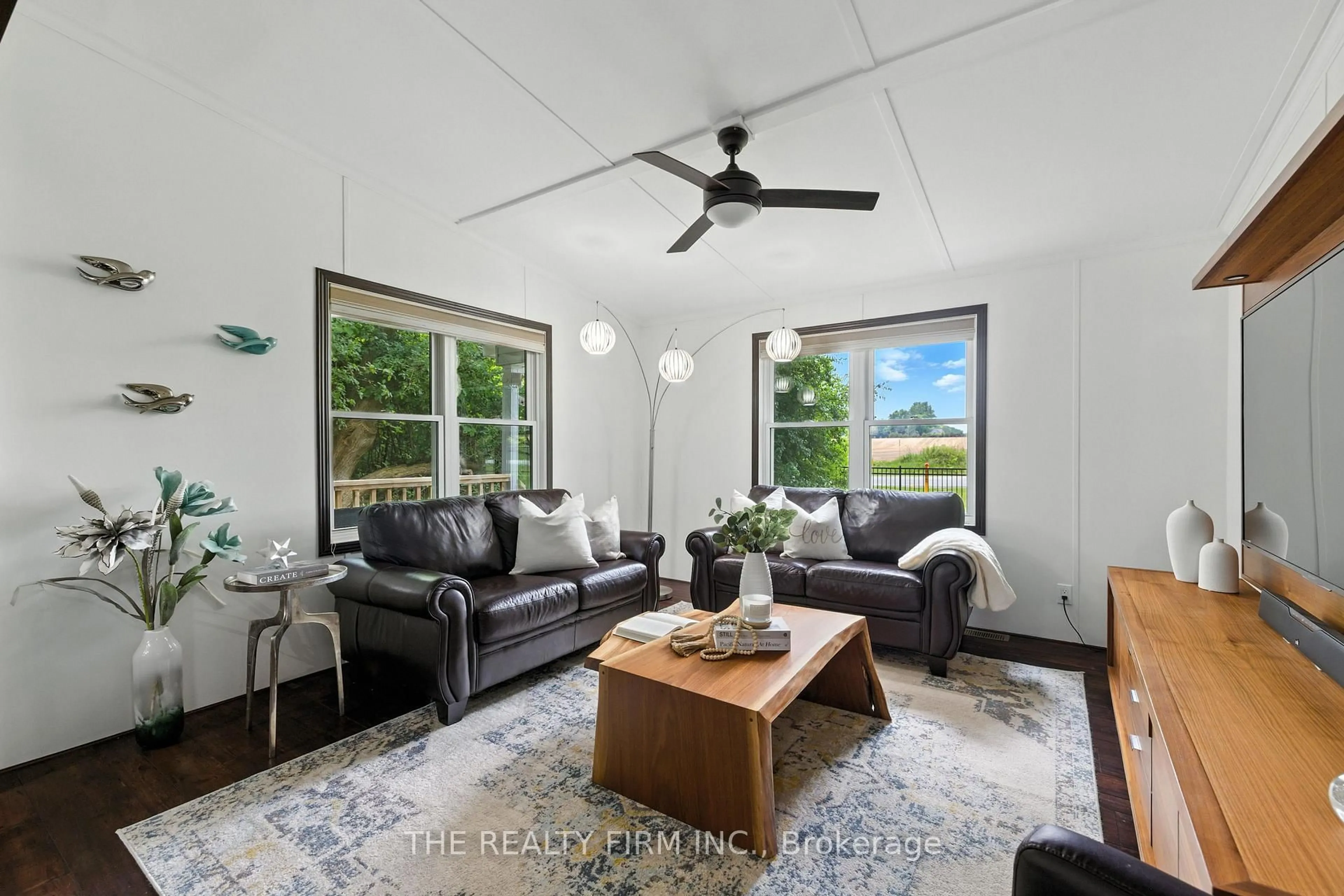 Living room with furniture, unknown for 22790 Amiens Rd #1, Middlesex Centre Ontario N0L 1R0