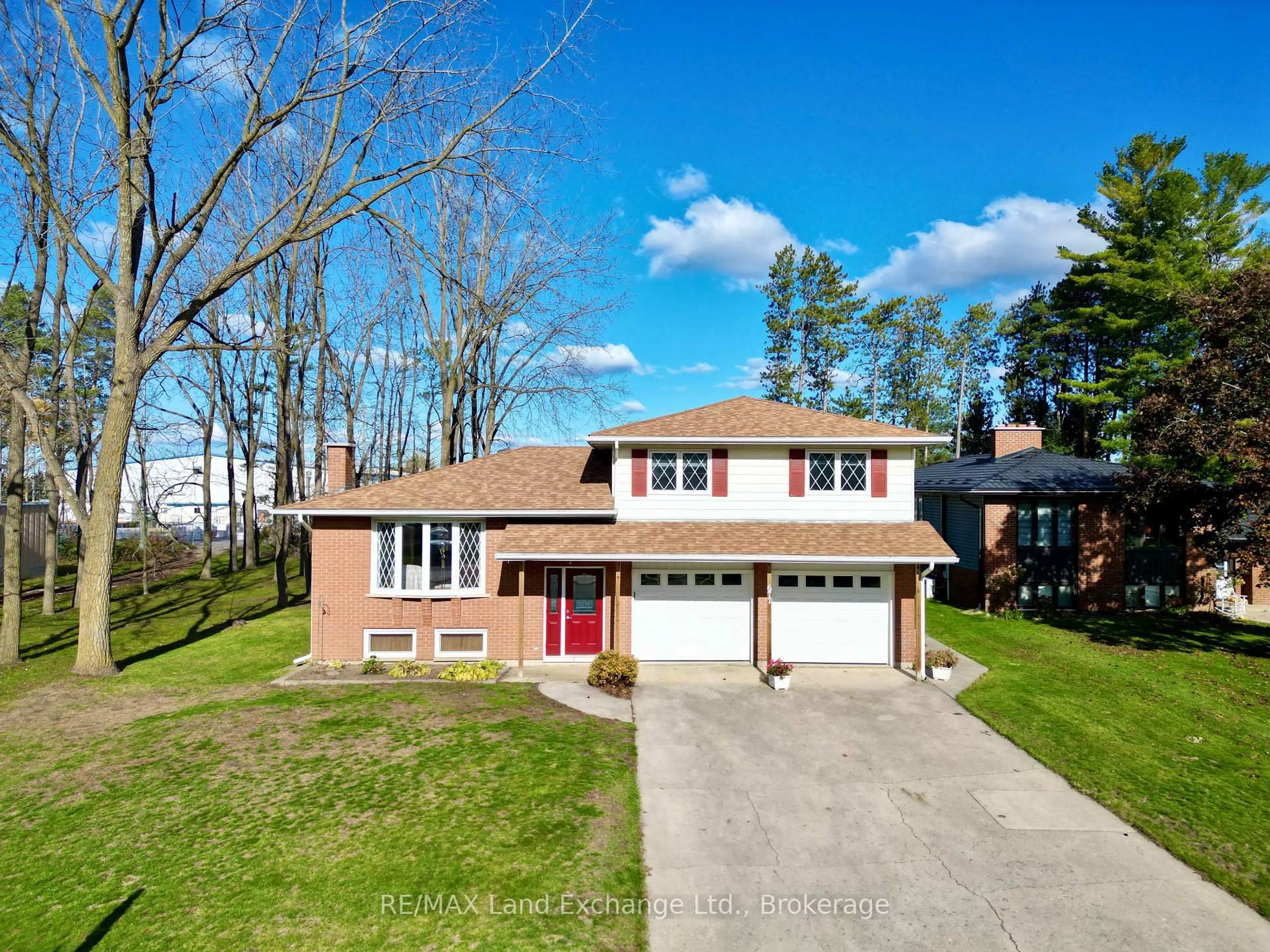 A pic from outside/outdoor area/front of a property/back of a property/a pic from drone, unknown for 677 Devonshire Rd, Saugeen Shores Ontario N0H 2C3