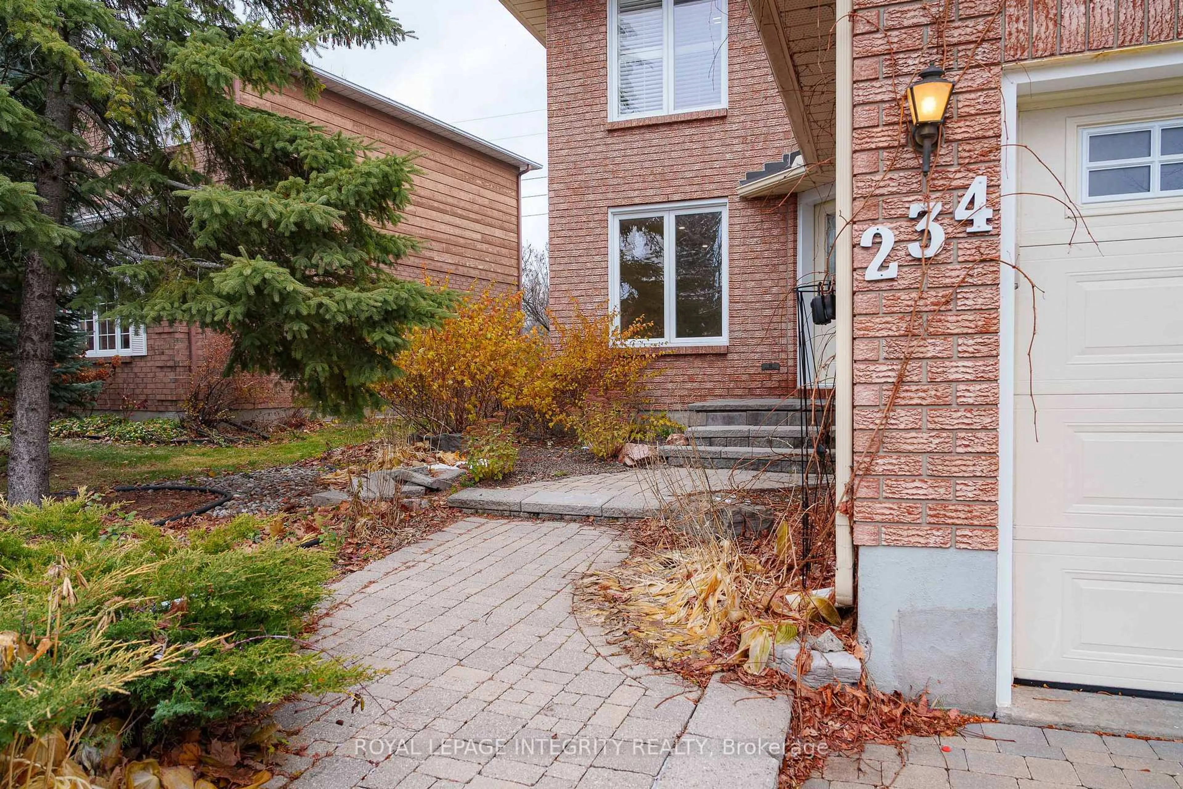 Home with brick exterior material, street for 234 Walden Dr, Ottawa Ontario K2K 2M3