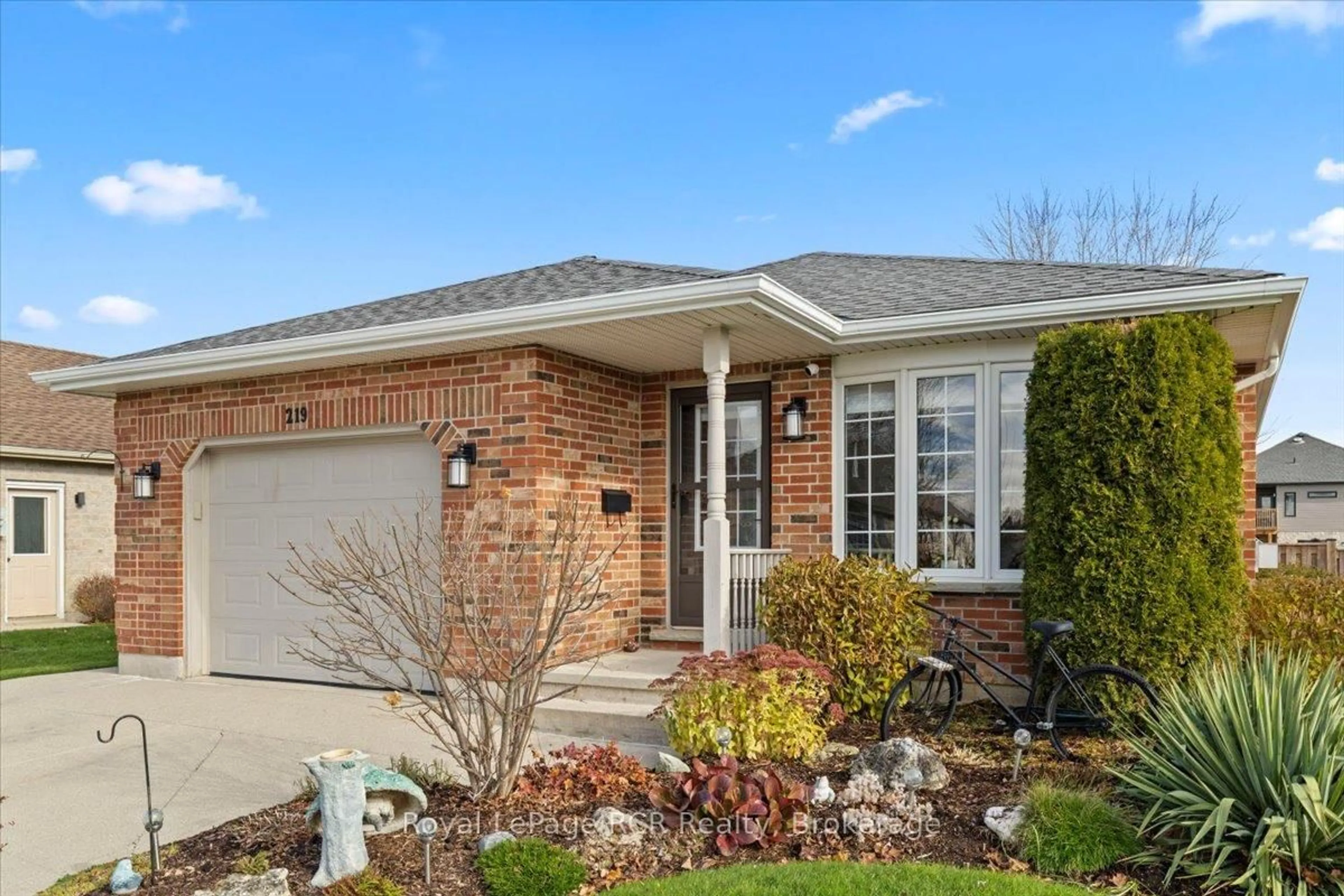 Home with brick exterior material, street for 219 16th Avenue Cres, Hanover Ontario N4N 3V3
