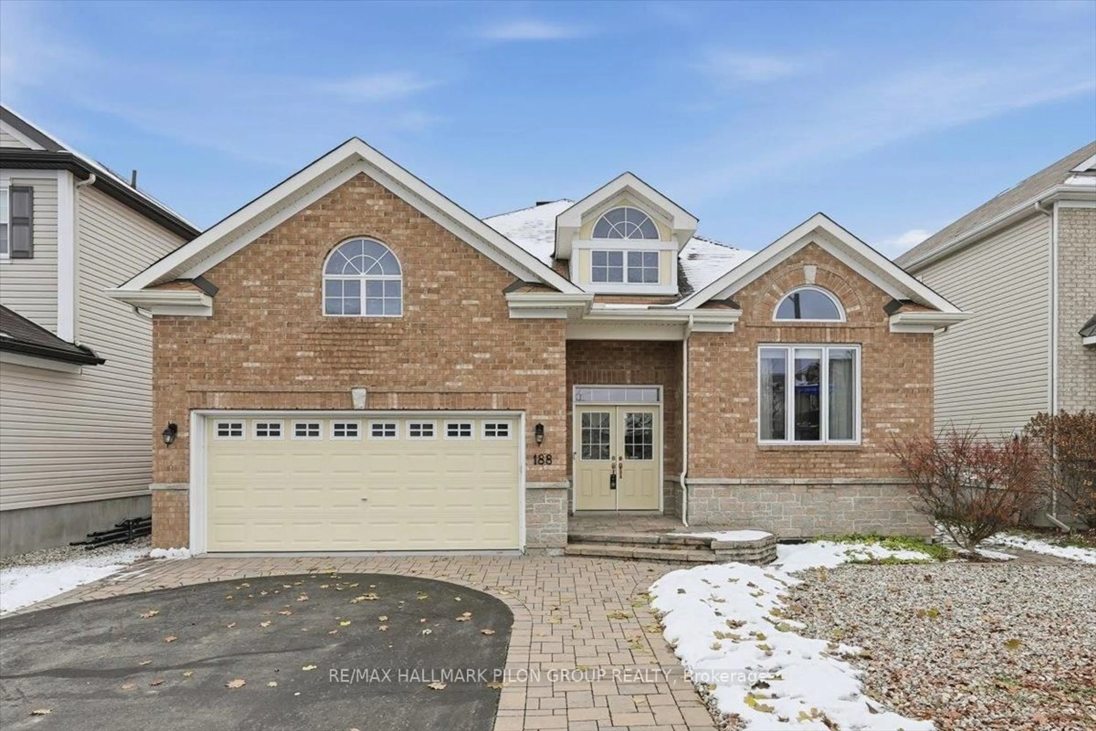 Home with brick exterior material, street for 188 Whispering Winds Way, Ottawa Ontario K1W 0B5