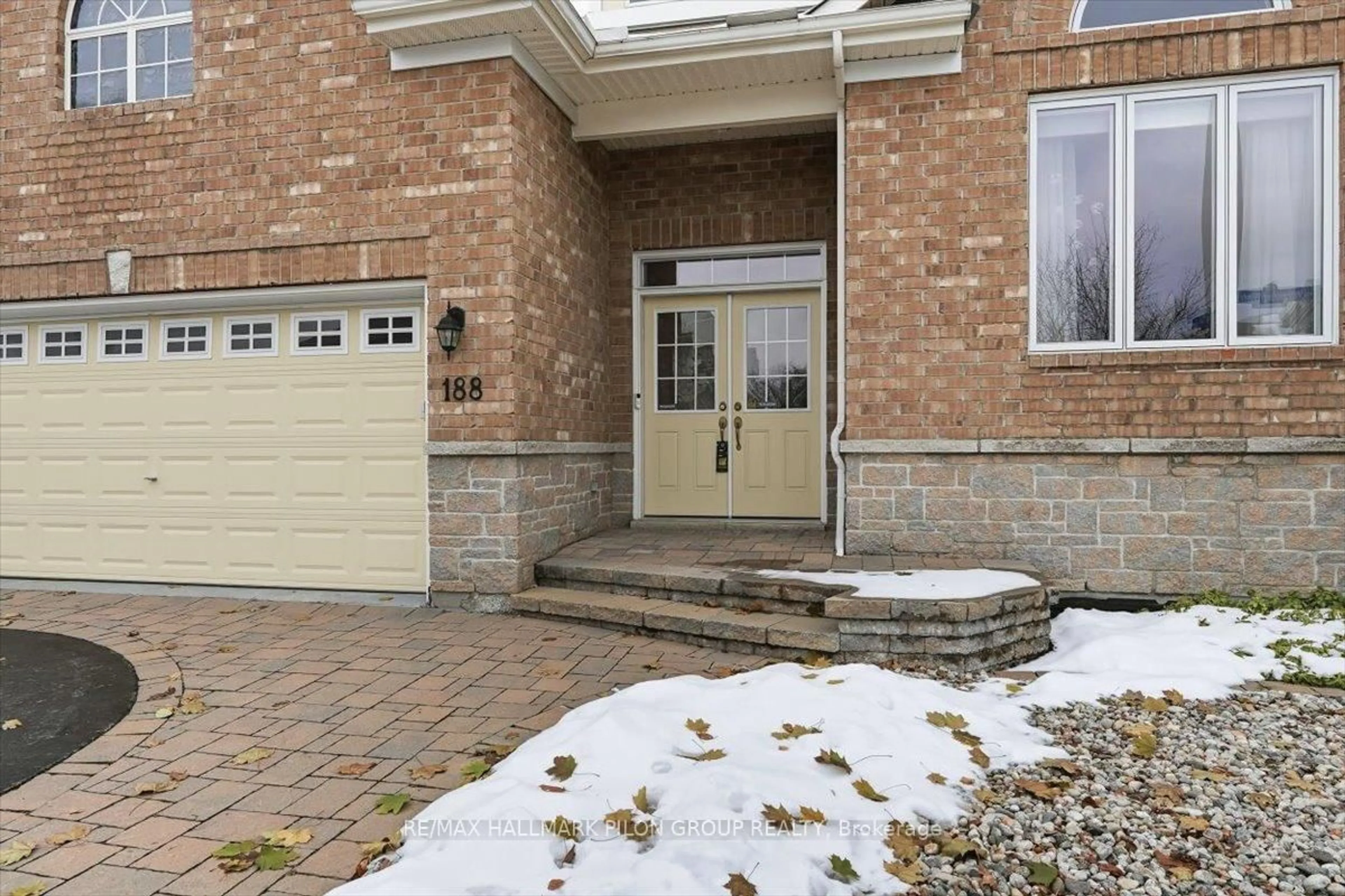Home with brick exterior material, street for 188 Whispering Winds Way, Ottawa Ontario K1W 0B5