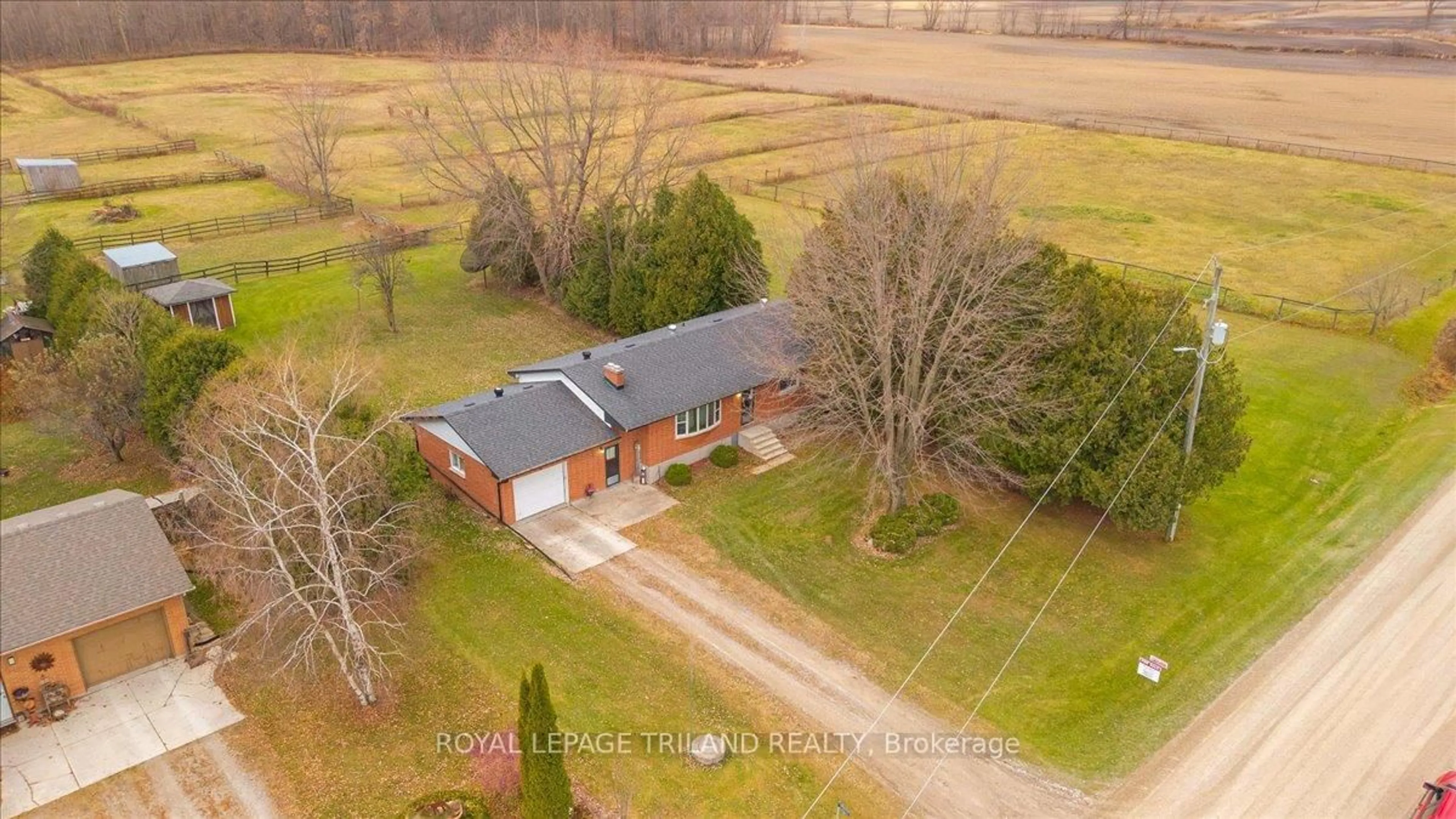 A pic from outside/outdoor area/front of a property/back of a property/a pic from drone, building for 22827 Mayfair Rd, Southwest Middlesex Ontario N0L 1A0