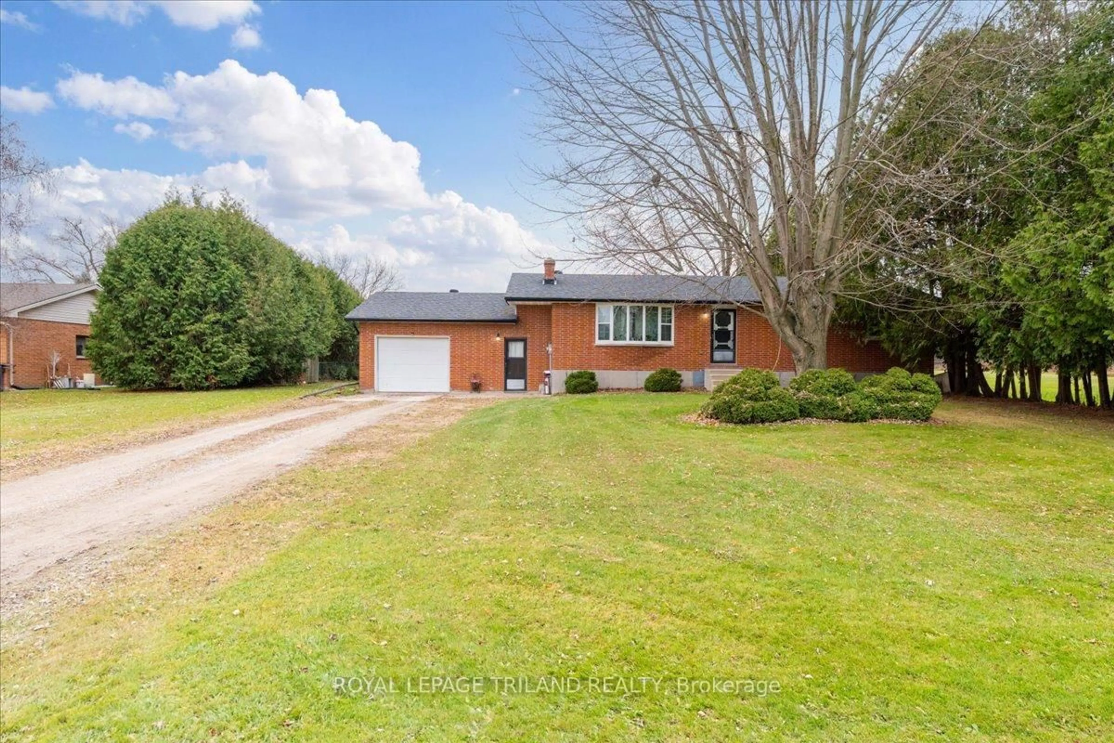 A pic from outside/outdoor area/front of a property/back of a property/a pic from drone, street for 22827 Mayfair Rd, Southwest Middlesex Ontario N0L 1A0