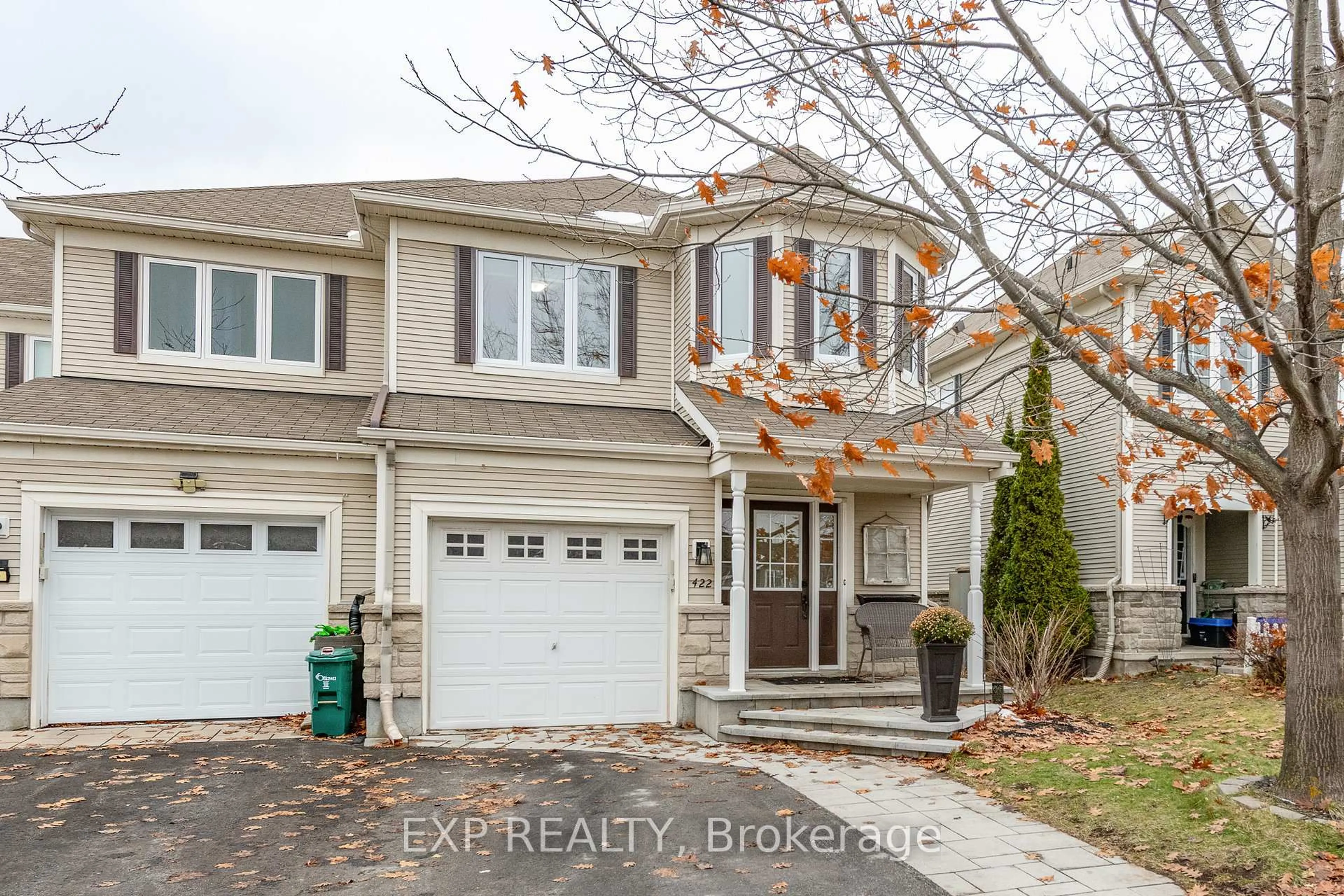 Home with vinyl exterior material, street for 422 Evenwood Private, Ottawa Ontario K2J 0E5