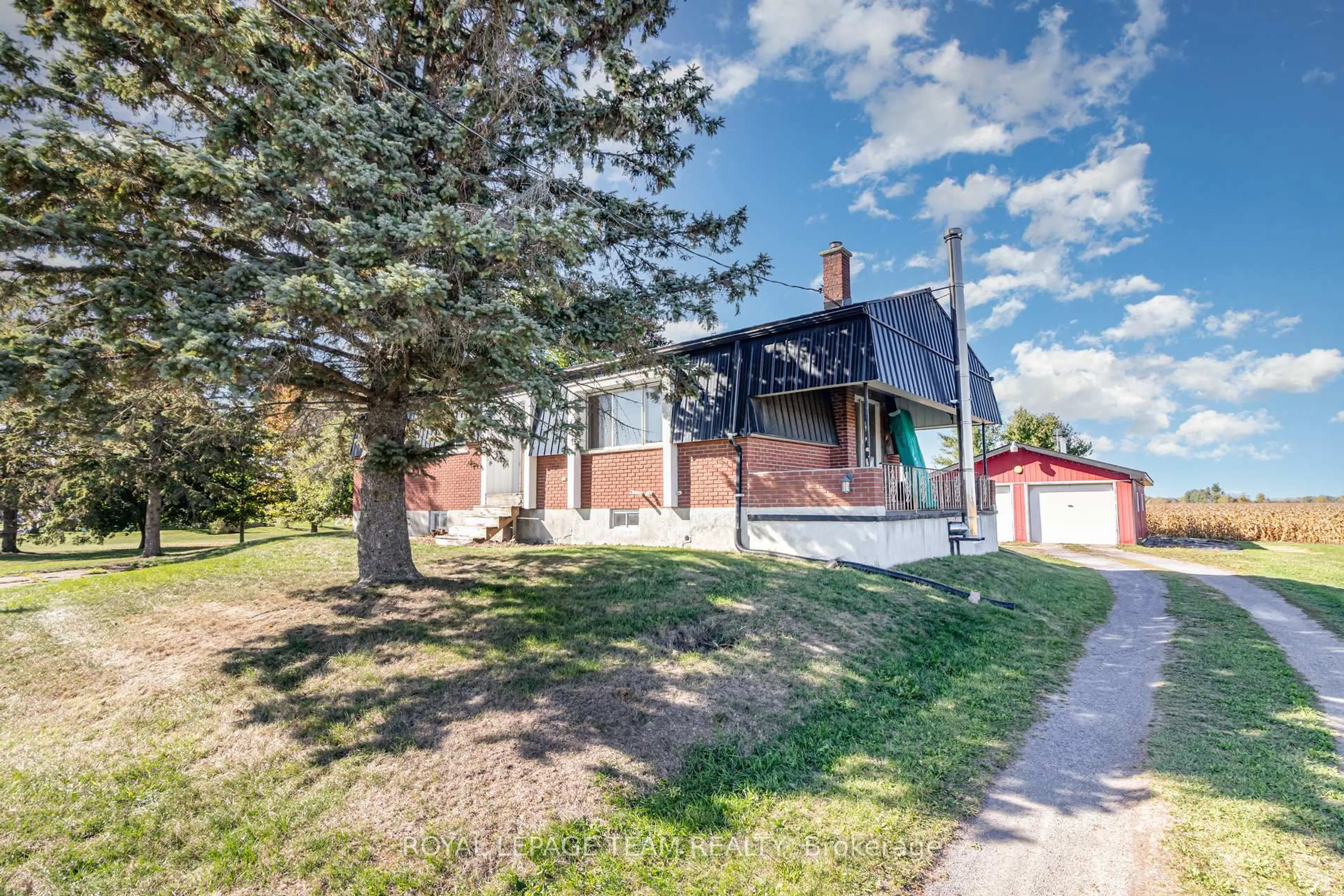 A pic from outside/outdoor area/front of a property/back of a property/a pic from drone, street for 12121 Liscumb Rd, North Dundas Ontario K0C 2K0