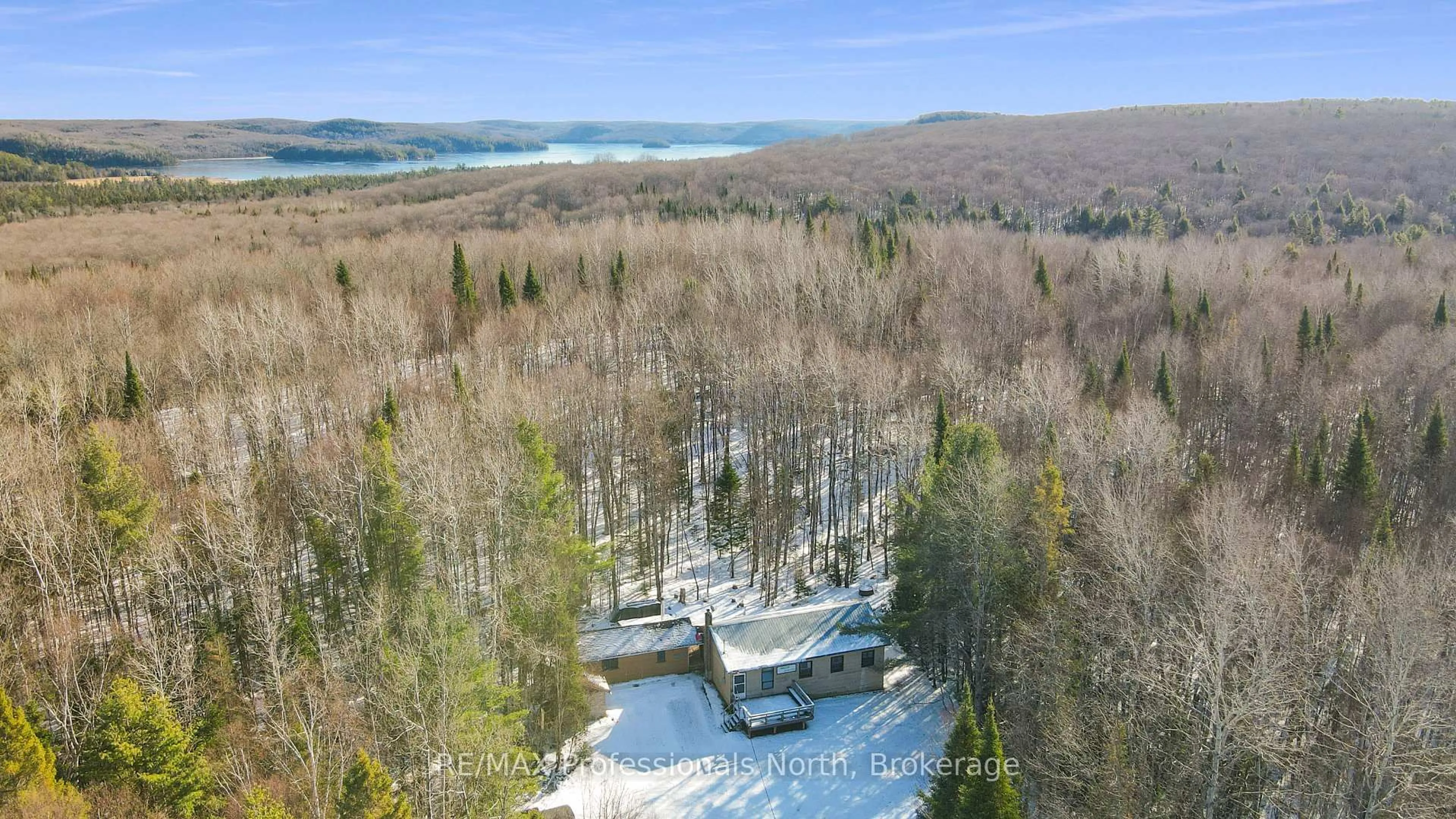 A pic from outside/outdoor area/front of a property/back of a property/a pic from drone, water/lake/river/ocean view for 1171 Fishtail Lake Rd, Dysart et al Ontario K0L 1M1