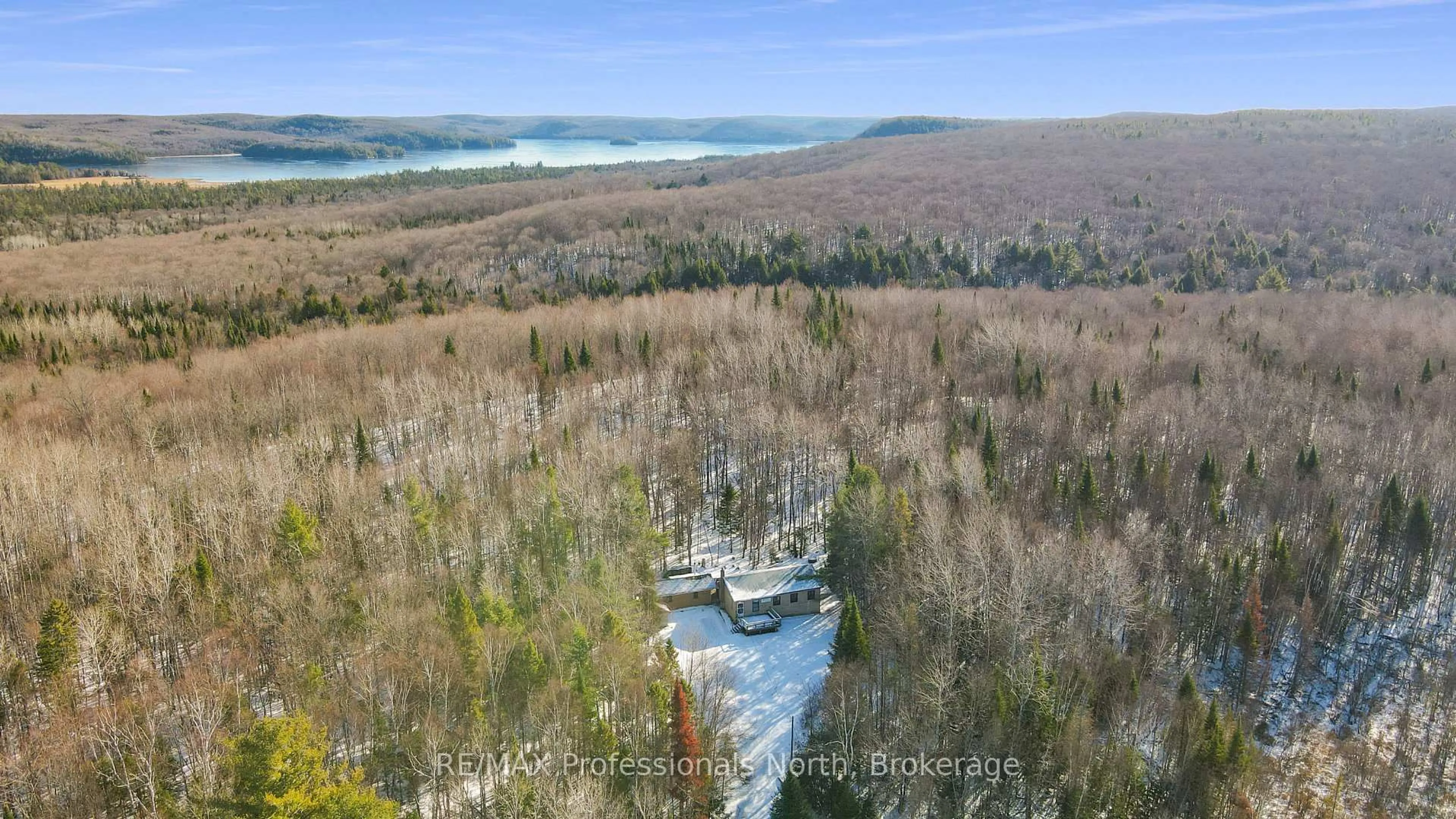 A pic from outside/outdoor area/front of a property/back of a property/a pic from drone, water/lake/river/ocean view for 1171 Fishtail Lake Rd, Dysart et al Ontario K0L 1M1