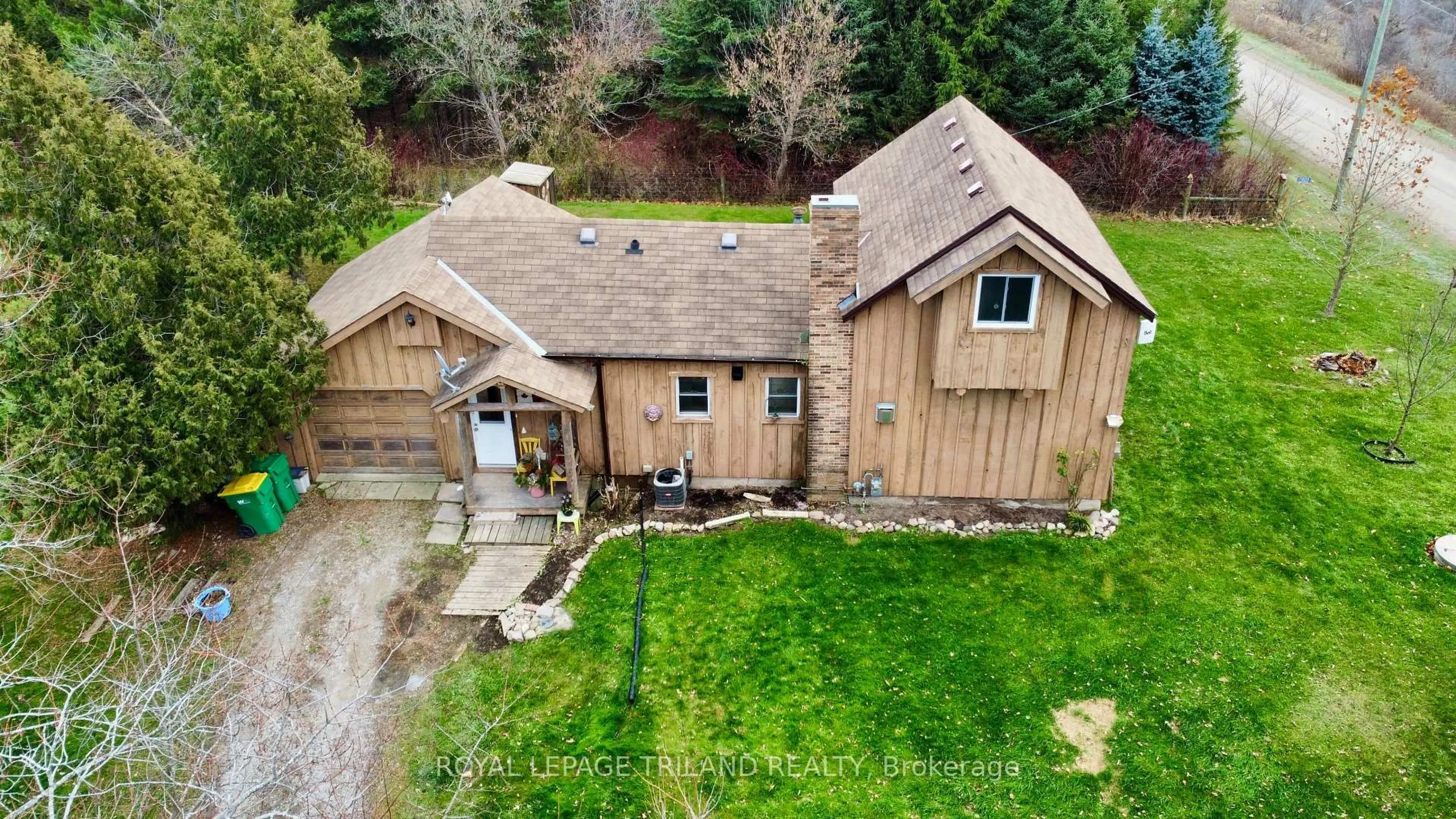 A pic from outside/outdoor area/front of a property/back of a property/a pic from drone, unknown for 21622 Dundonald Rd, Southwest Middlesex Ontario N0L 1M0