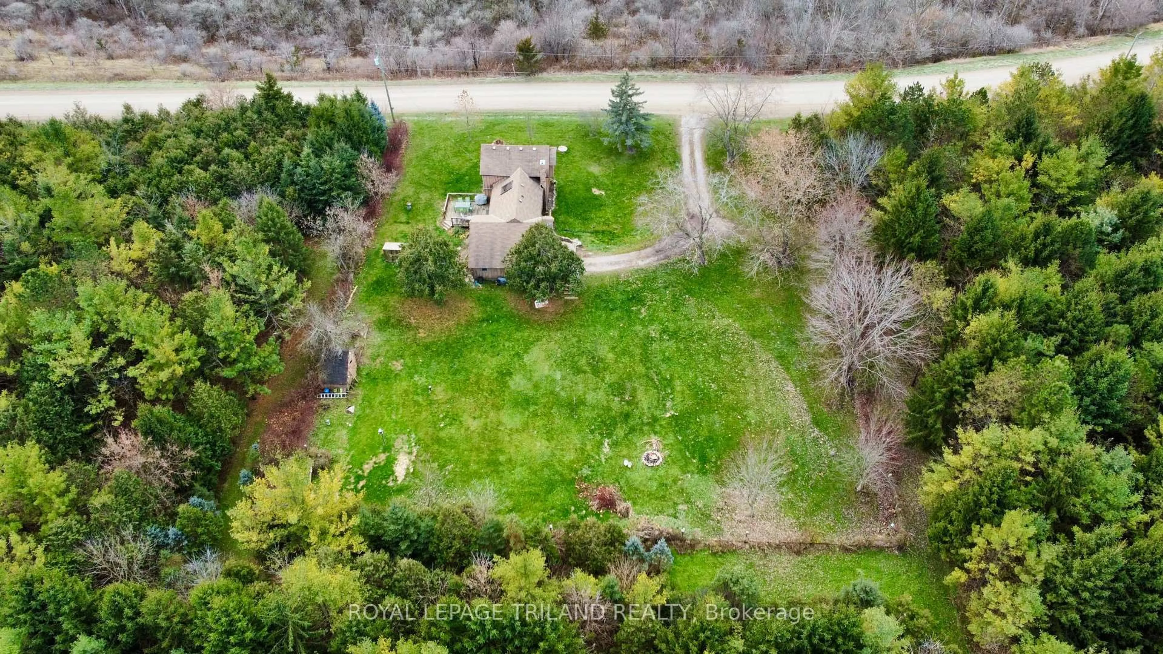 A pic from outside/outdoor area/front of a property/back of a property/a pic from drone, unknown for 21622 Dundonald Rd, Southwest Middlesex Ontario N0L 1M0