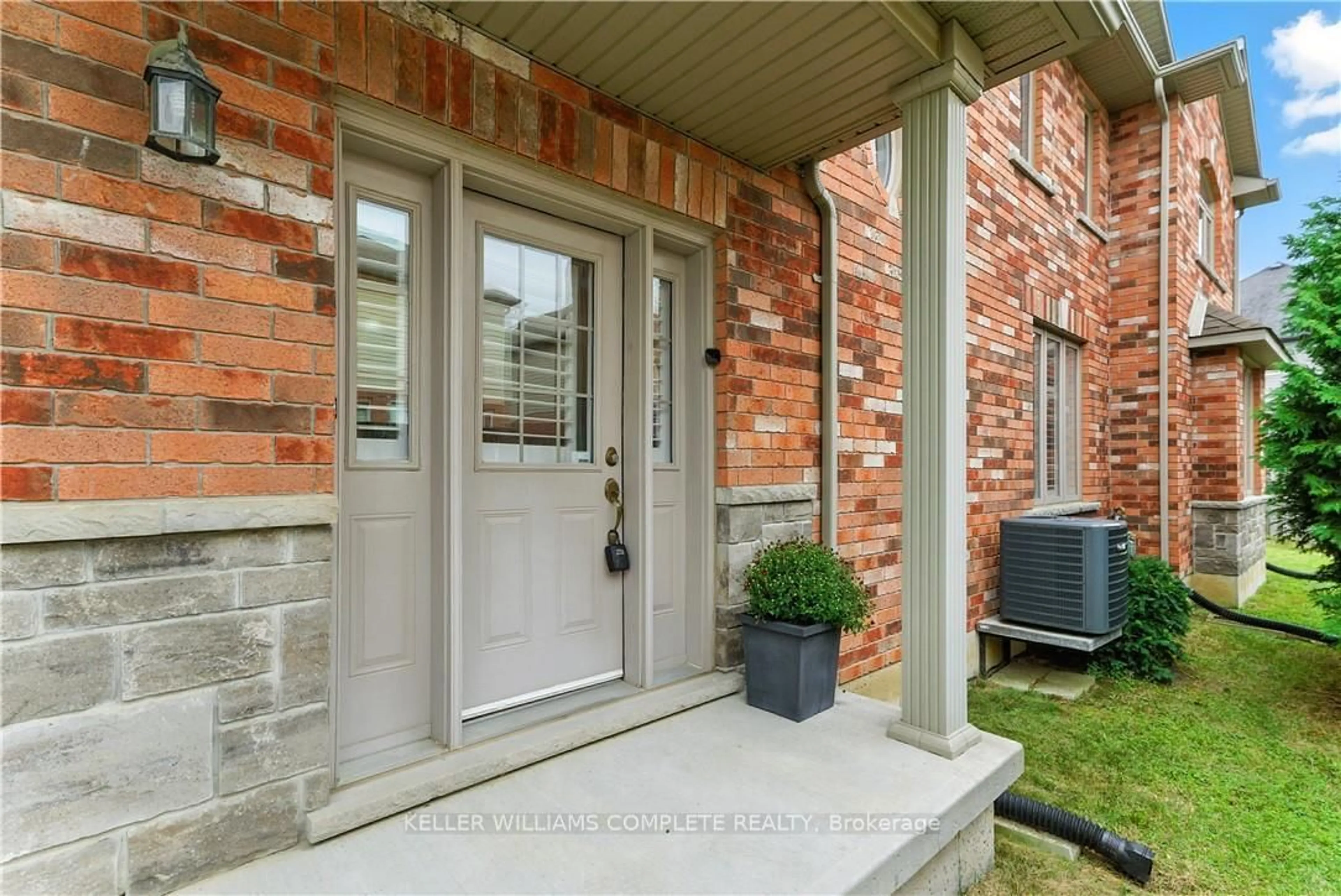 Home with brick exterior material, street for 100 Fall Fair Way, Hamilton Ontario L0R 1C0
