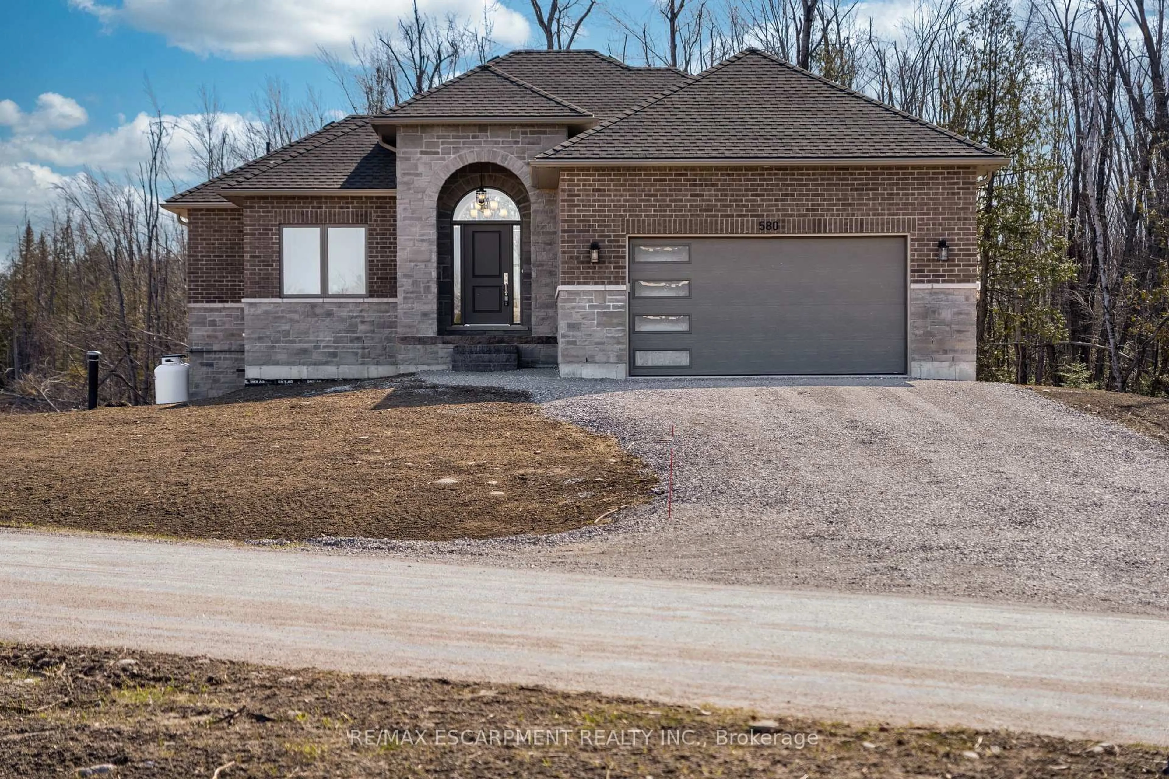 Home with brick exterior material, street for 580 Patterson Rd, Kawartha Lakes Ontario K0M 1N0