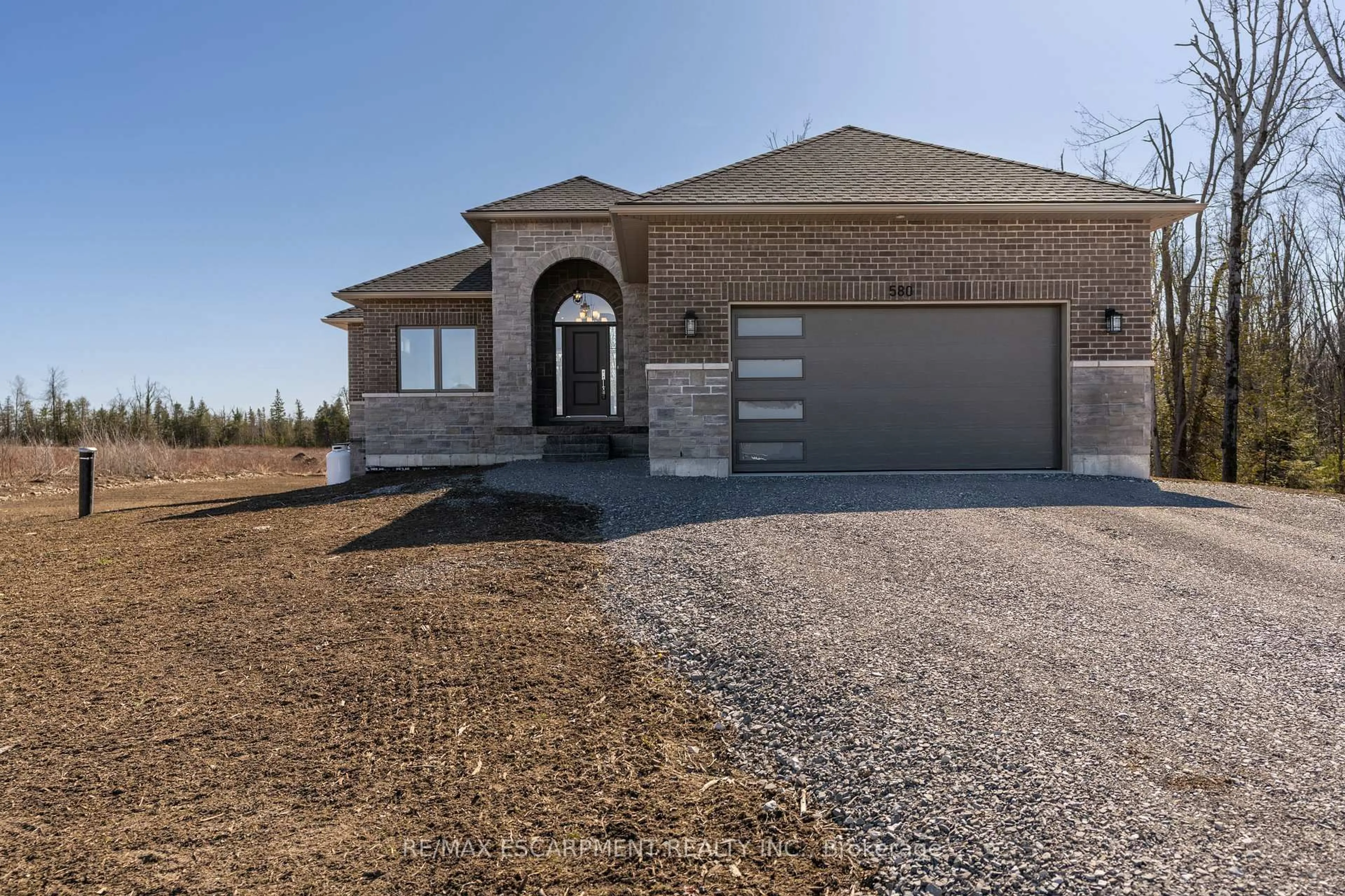 Home with brick exterior material, street for 580 Patterson Rd, Kawartha Lakes Ontario K0M 1N0