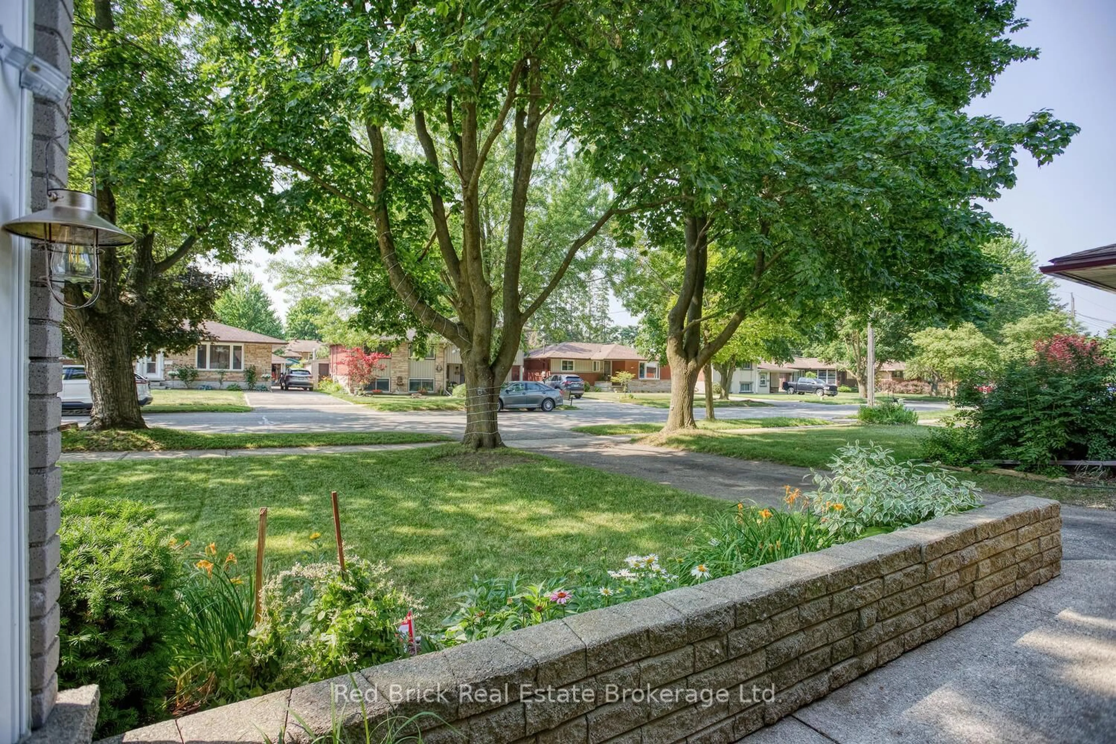A pic from outside/outdoor area/front of a property/back of a property/a pic from drone, street for 302 Ross Ave, Kitchener Ontario N2A 1V6