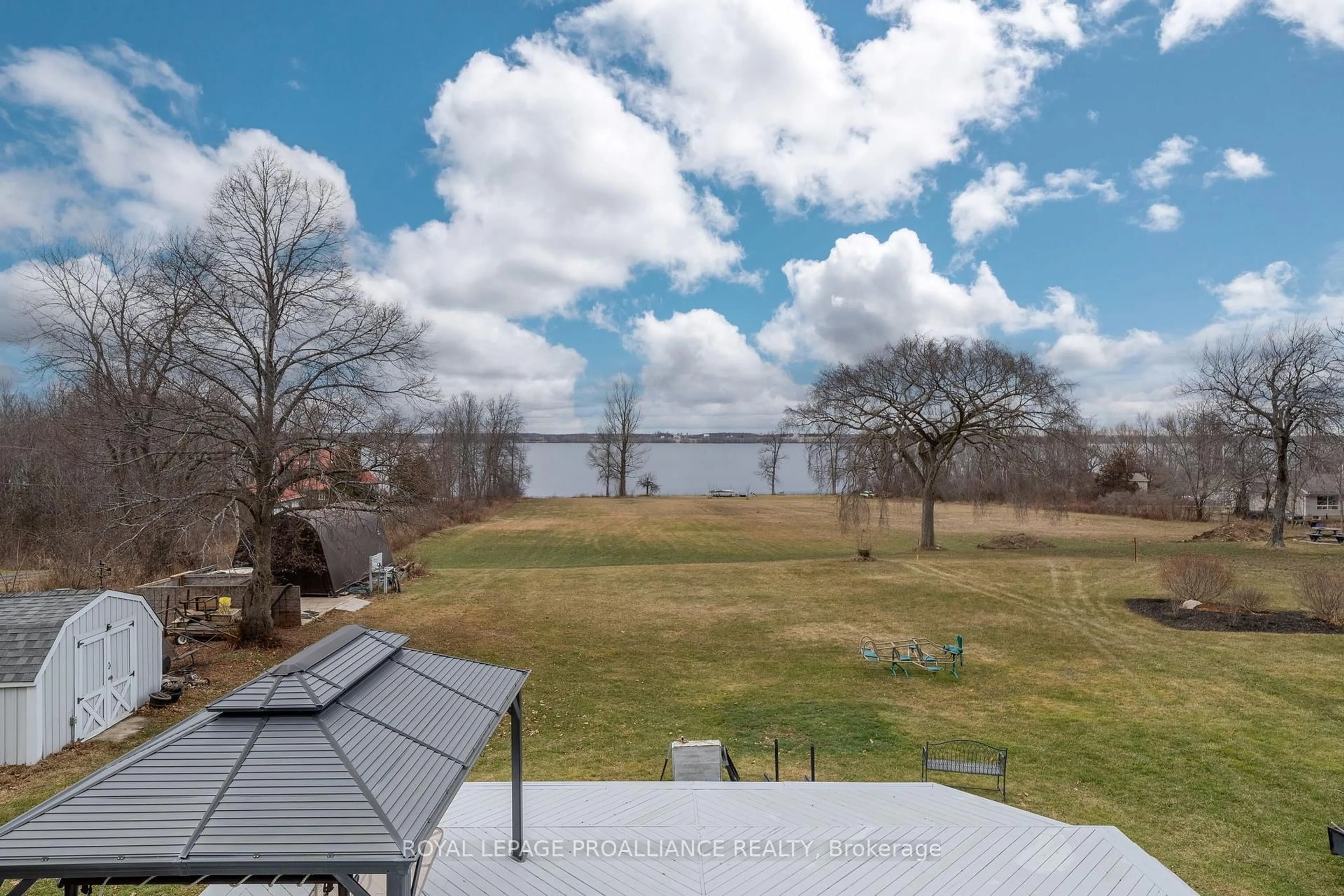 A pic from outside/outdoor area/front of a property/back of a property/a pic from drone, water/lake/river/ocean view for 25 Prinyers Cove Cres, Prince Edward County Ontario K0K 2T0